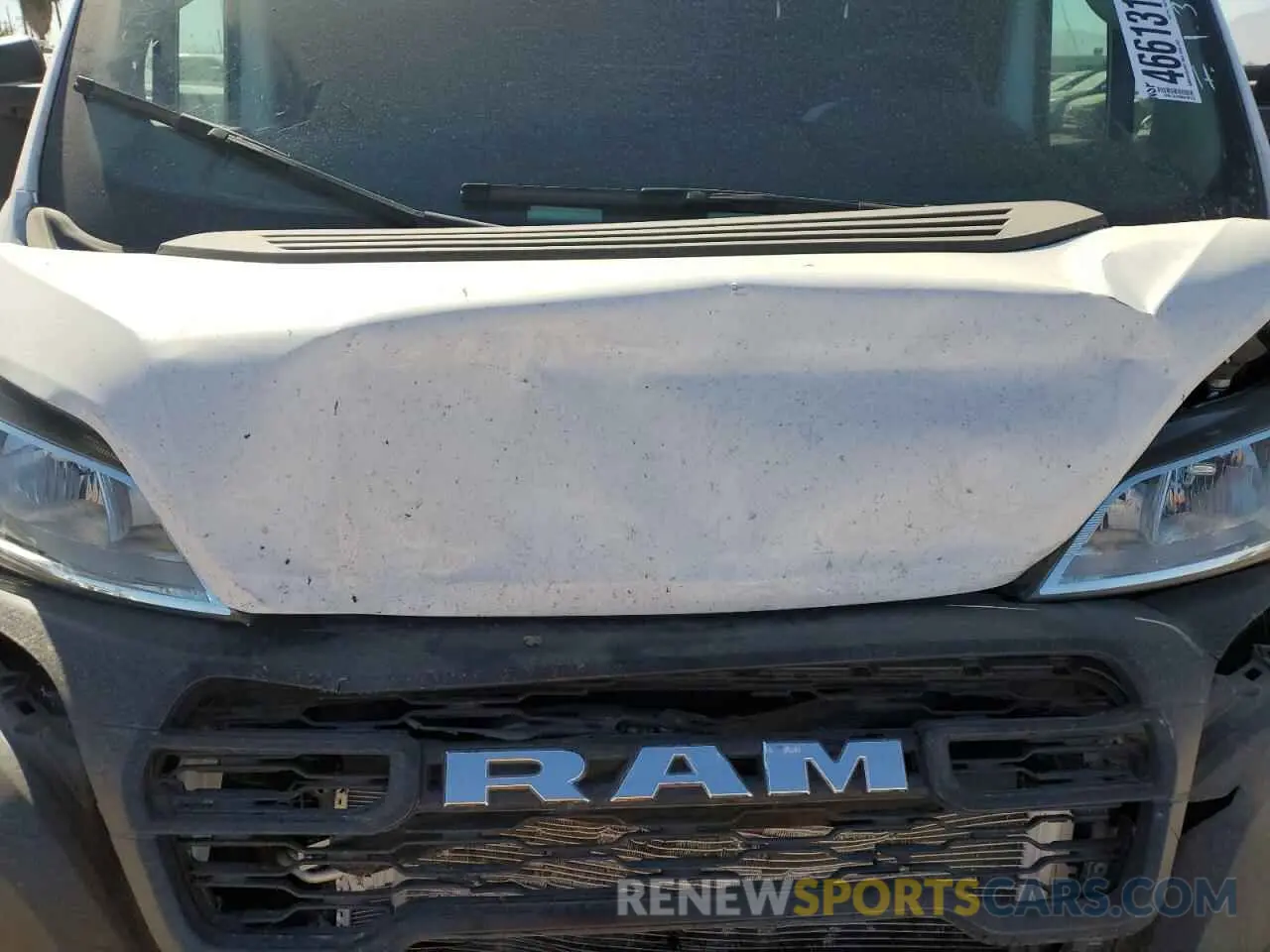 13 Photograph of a damaged car 3C6LRVDG9PE578176 RAM All Models 2023