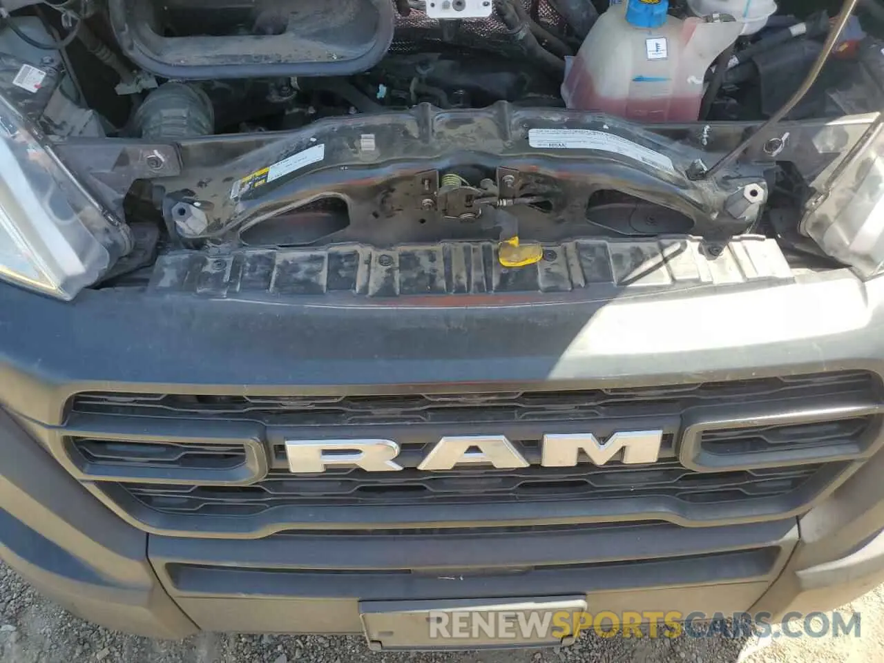 13 Photograph of a damaged car 3C6LRVVG4PE527201 RAM All Models 2023
