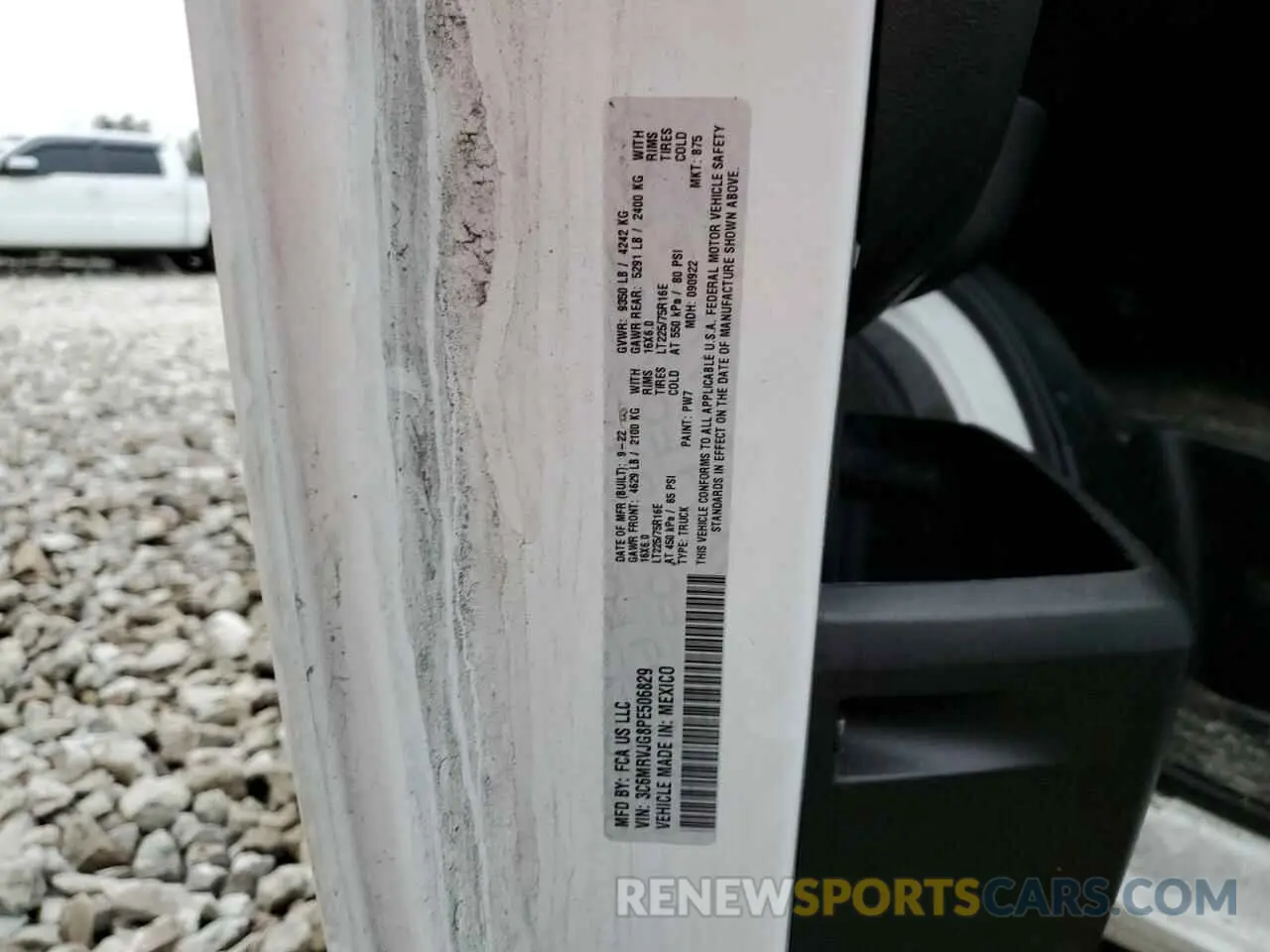 13 Photograph of a damaged car 3C6MRVJG8PE506829 RAM All Models 2023