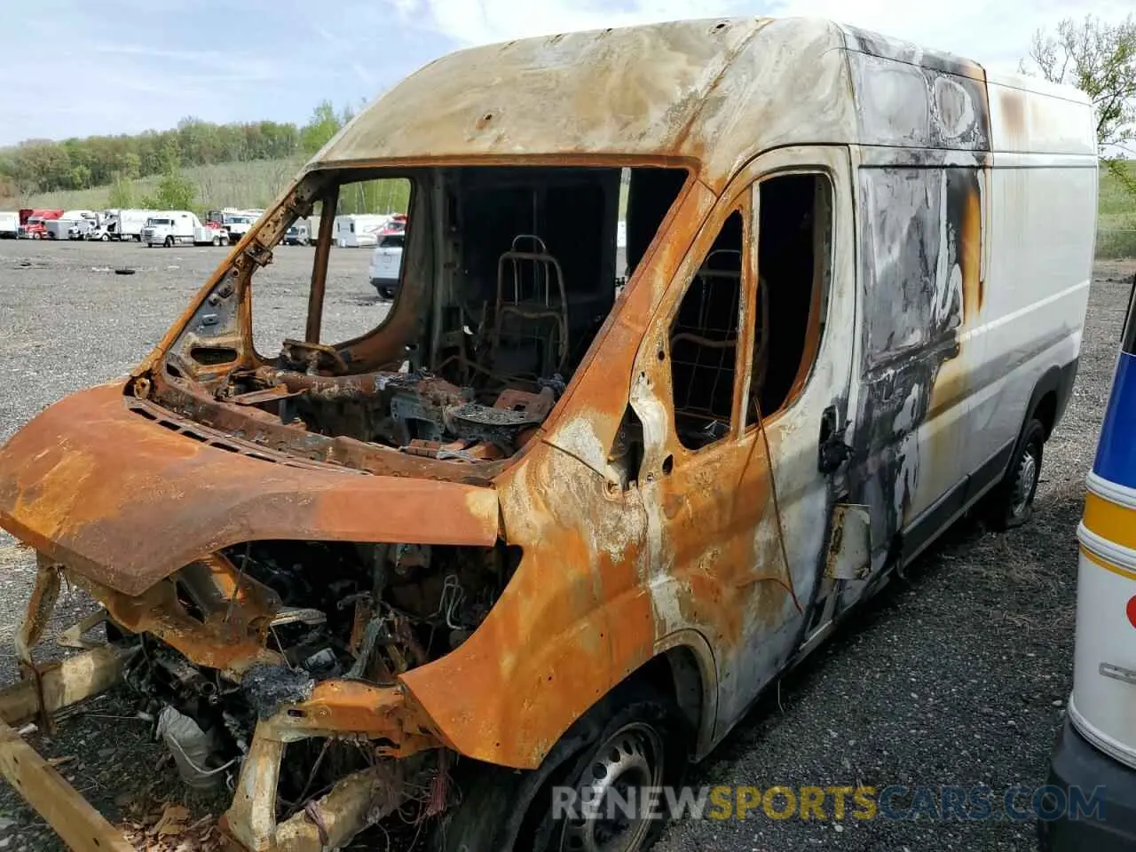 1 Photograph of a damaged car 3C6LRVDG7RE136824 RAM All Models 2024