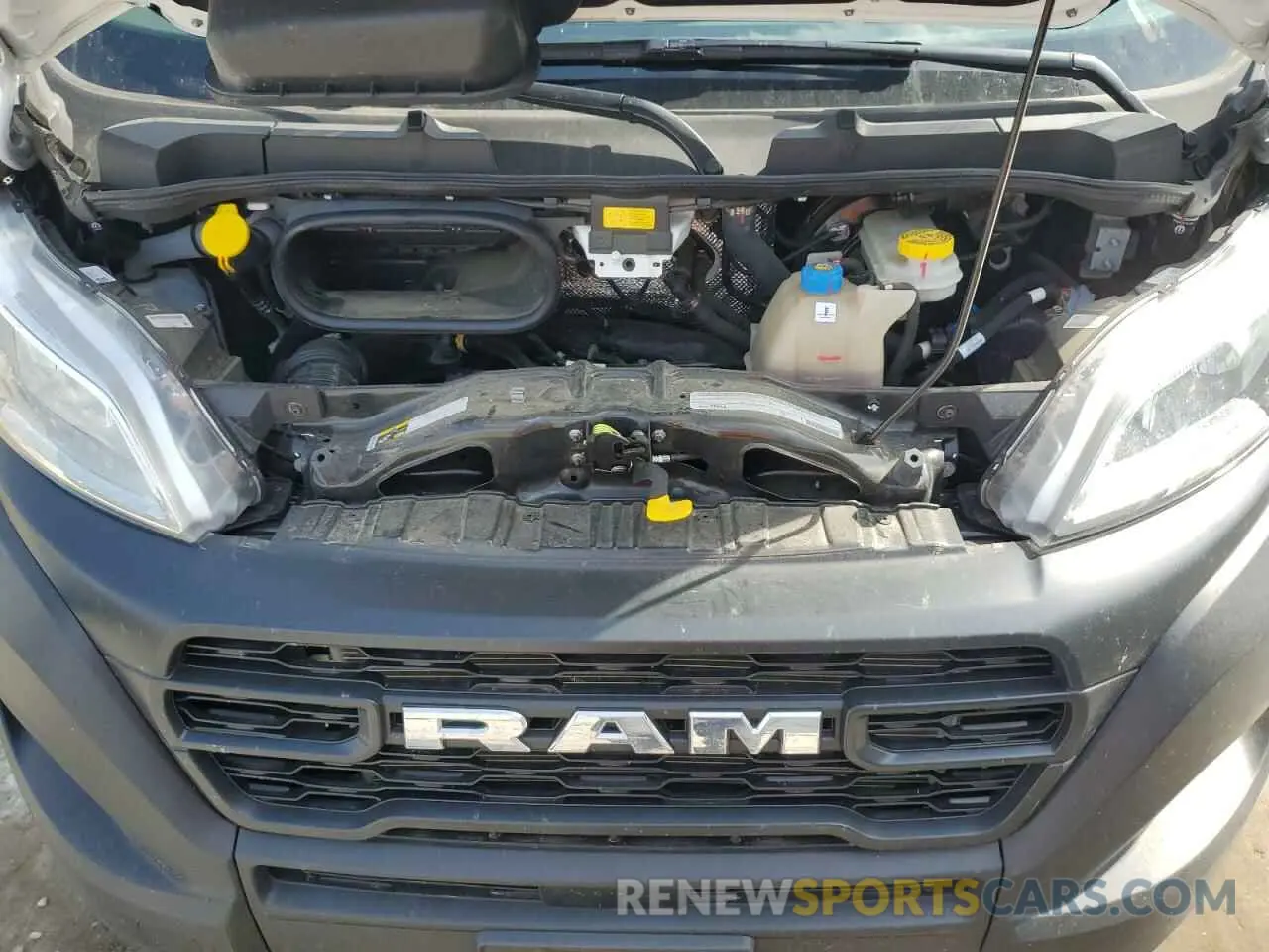 12 Photograph of a damaged car 3C6LRVDGXRE150992 RAM All Models 2024