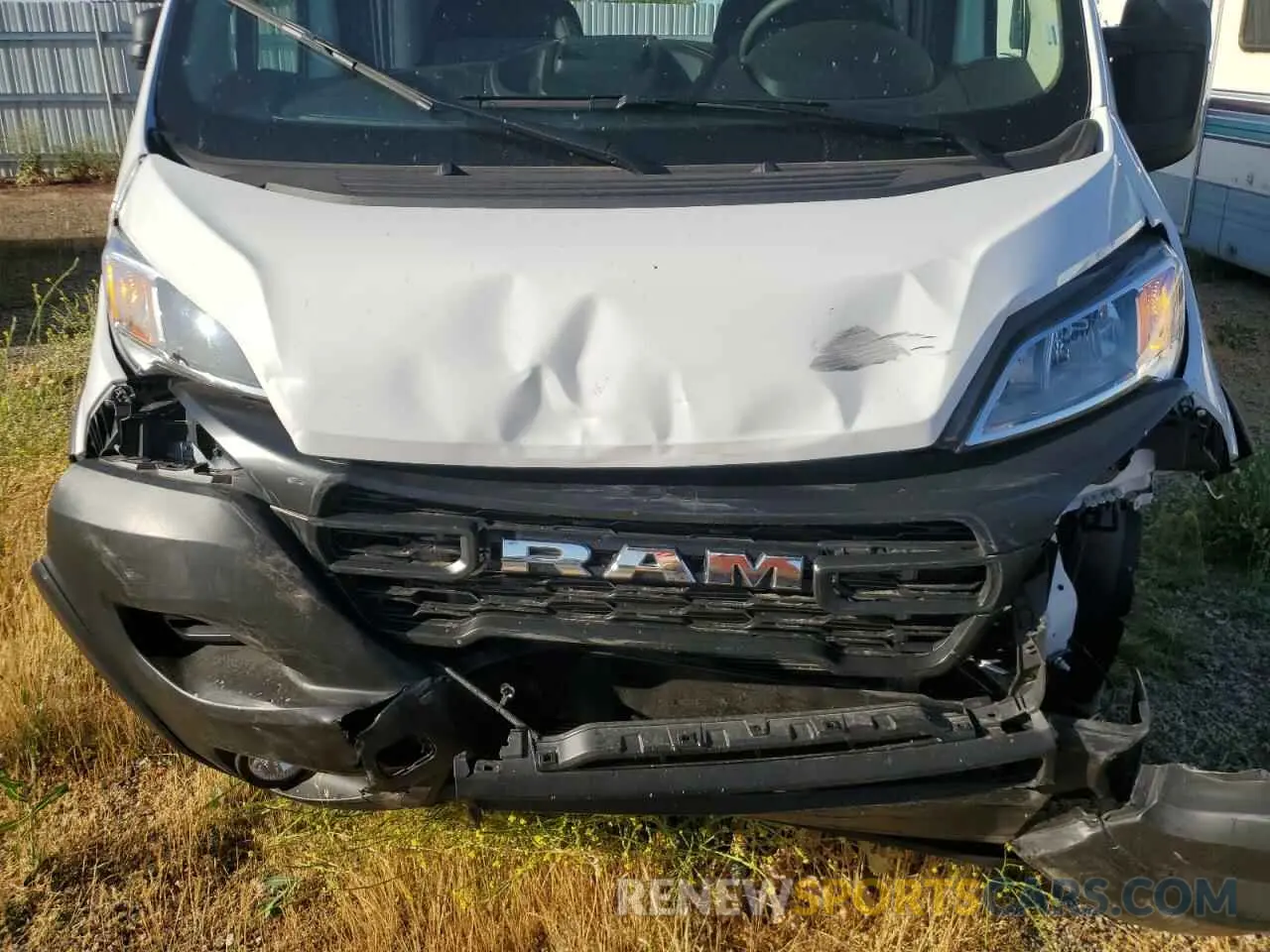 12 Photograph of a damaged car 3C6LRVDGXSE519744 RAM All Models 2025