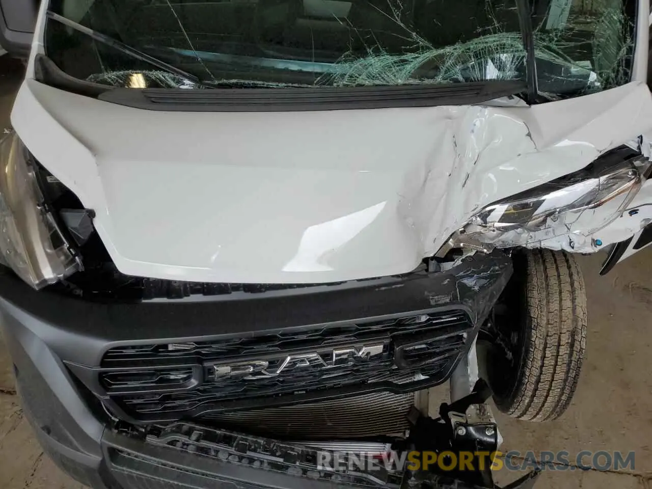 12 Photograph of a damaged car 3C6MRVHG9SE549249 RAM All Models 2025