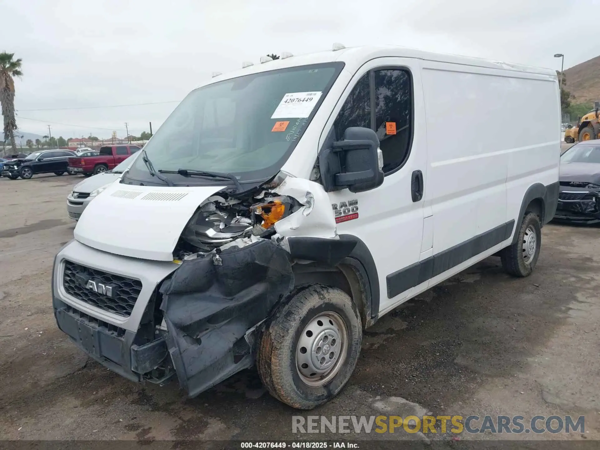 2 Photograph of a damaged car 3C6TRVAG0KE525704 RAM PROMASTER 1500 2019