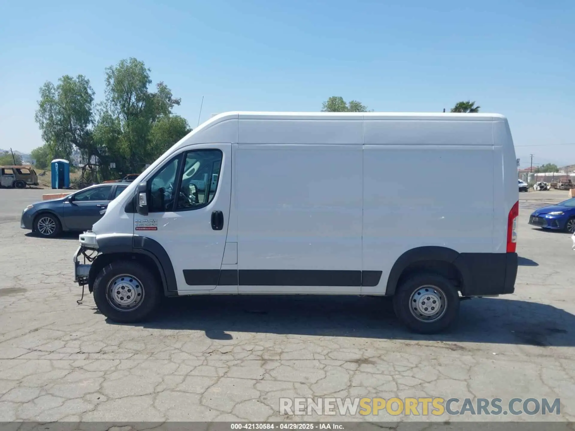 14 Photograph of a damaged car 3C6TRVBG9KE515865 RAM PROMASTER 1500 2019