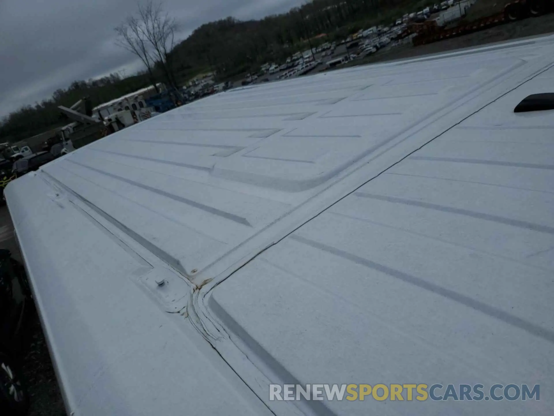 12 Photograph of a damaged car 3C6TRVNG6KE522560 RAM PROMASTER 1500 2019