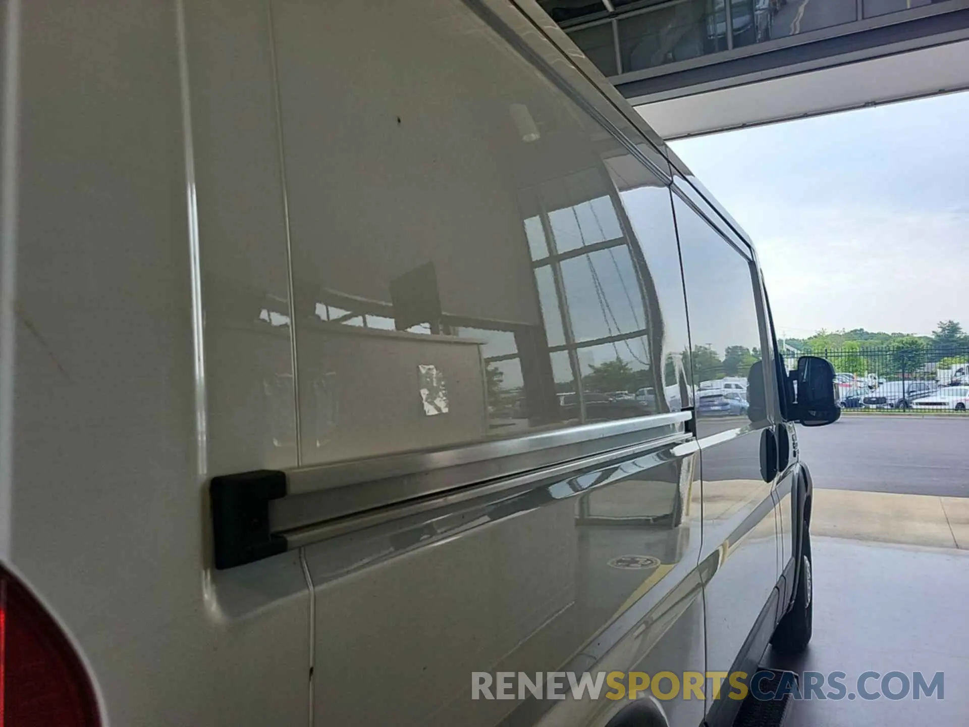 14 Photograph of a damaged car 3C6TRVAG7LE141579 RAM PROMASTER 1500 2020