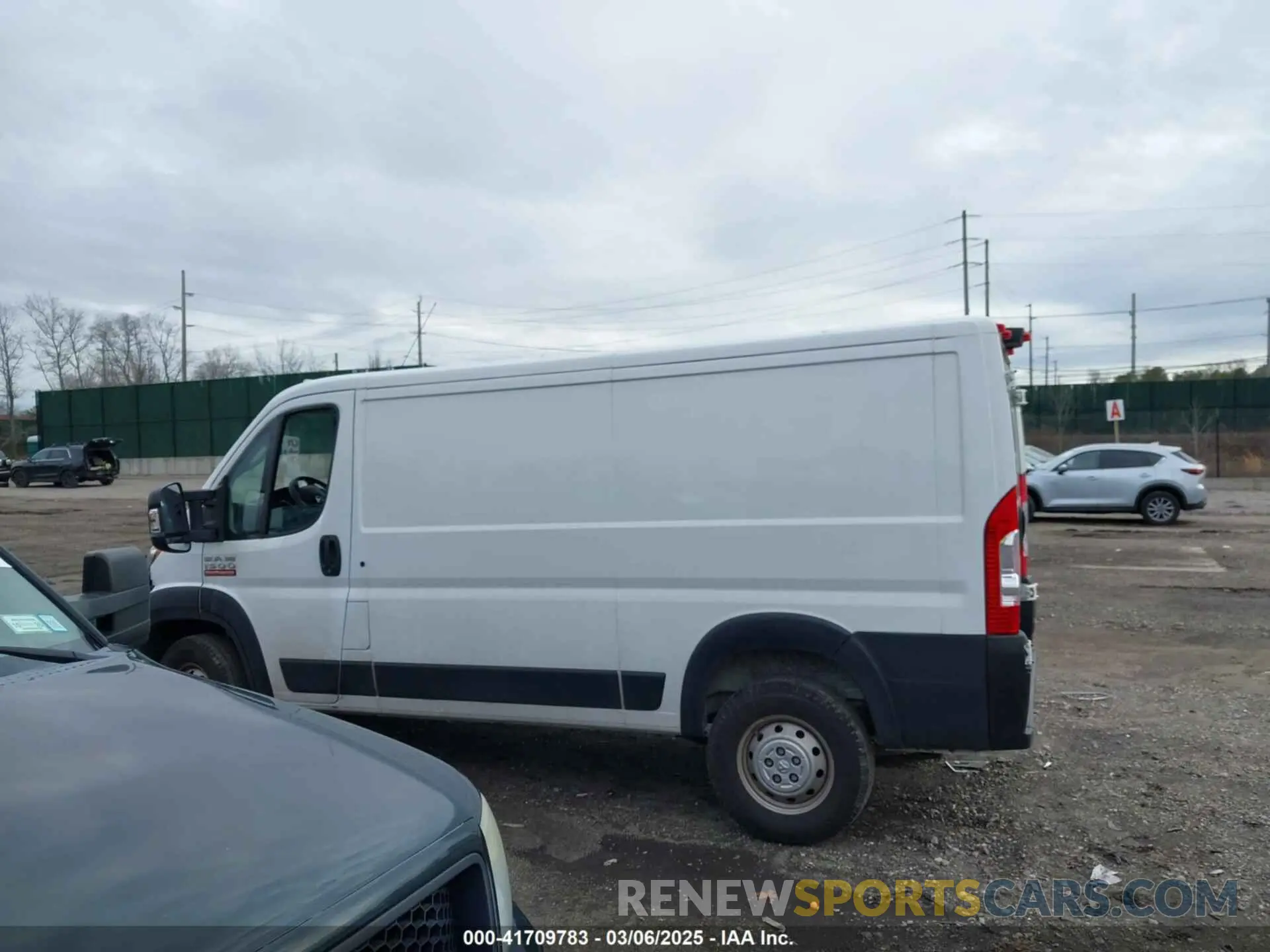 14 Photograph of a damaged car 3C6LRVAGXME559894 RAM PROMASTER 1500 2021