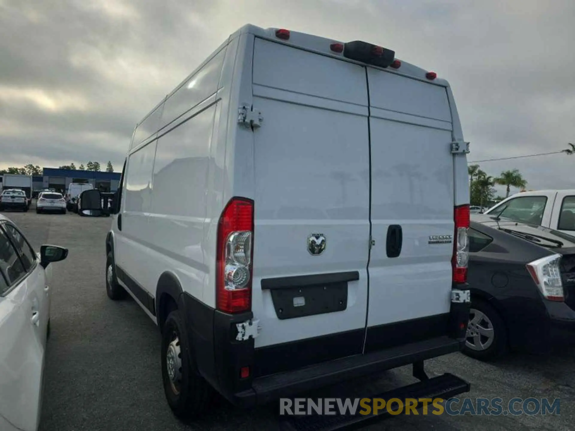 13 Photograph of a damaged car 3C6LRVBG0PE585939 RAM PROMASTER 1500 2023