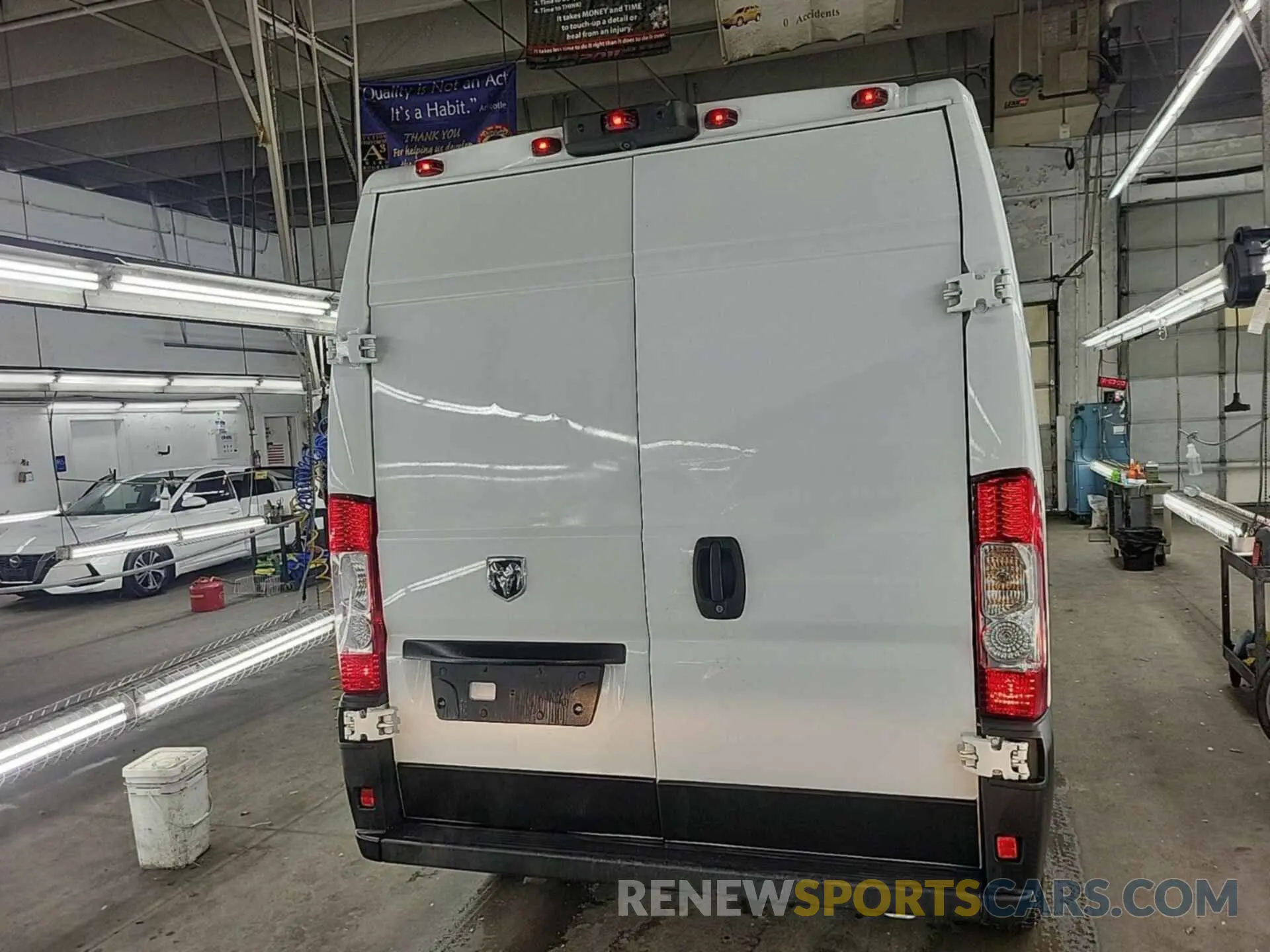 37 Photograph of a damaged car 3C6TRVDG3KE501005 RAM PROMASTER 2500 2019