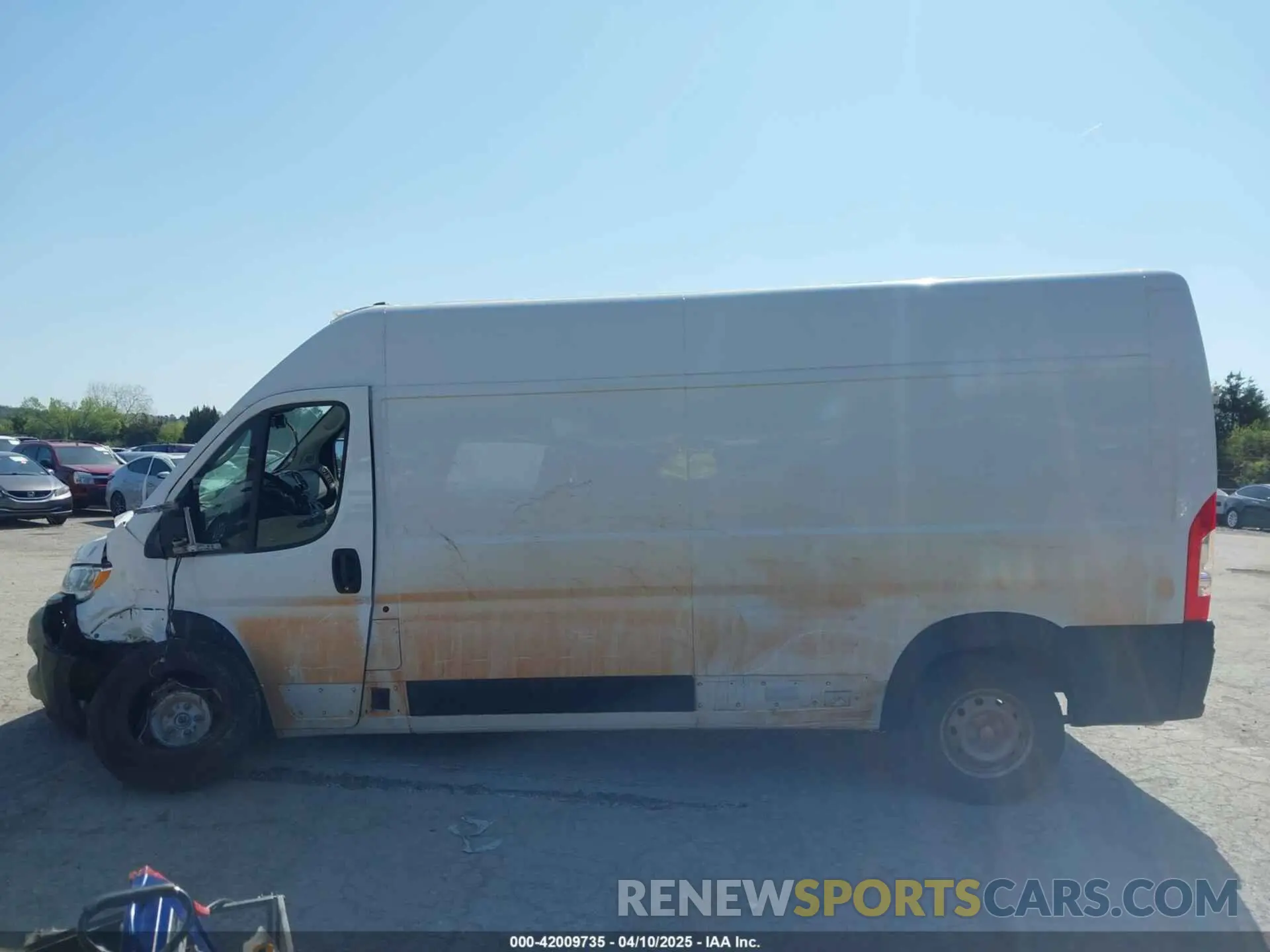 14 Photograph of a damaged car 3C6LRVDG3PE582496 RAM PROMASTER 2500 2023