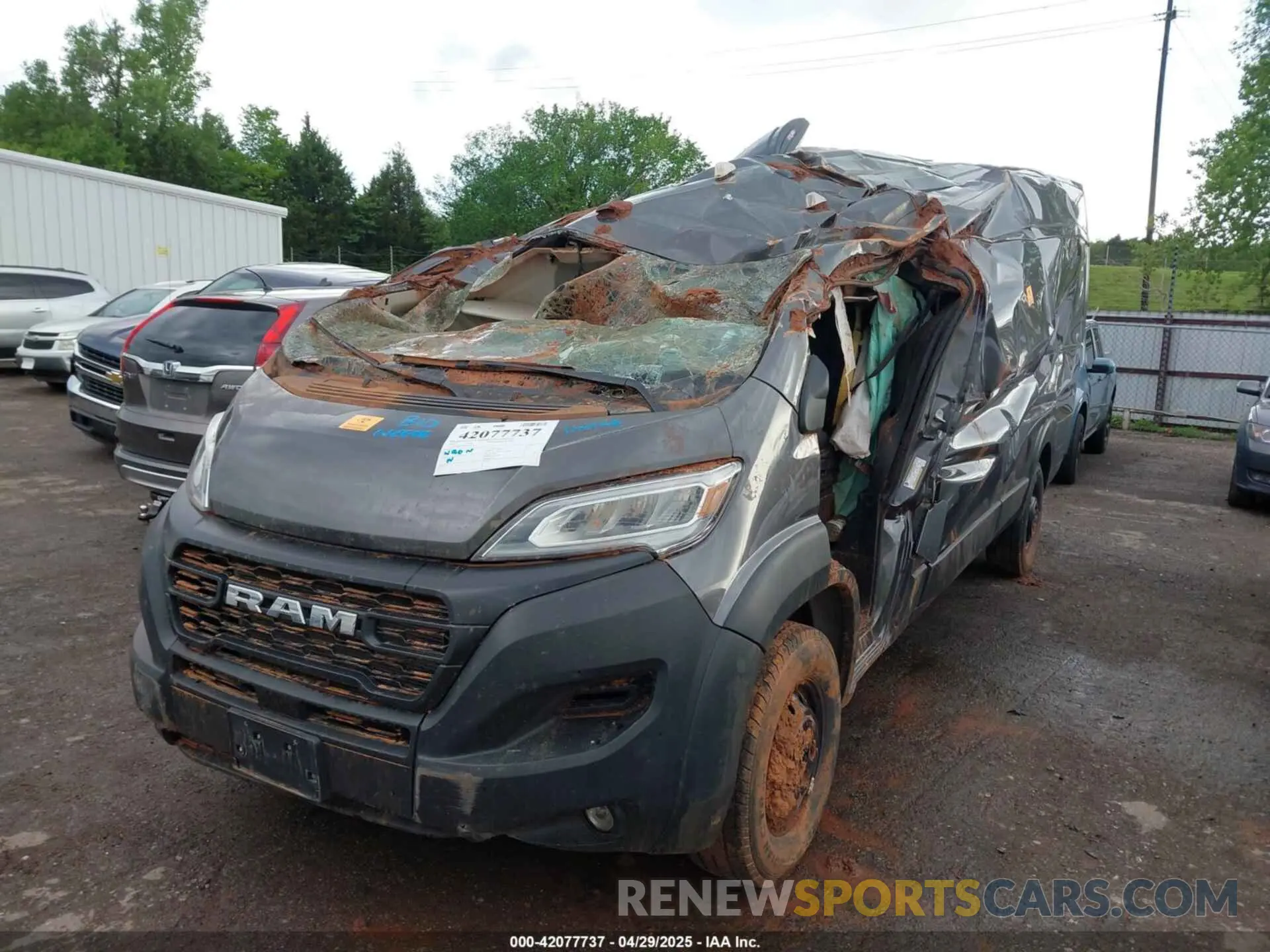 2 Photograph of a damaged car 3C6MRVJG8PE574547 RAM PROMASTER 3500 2023
