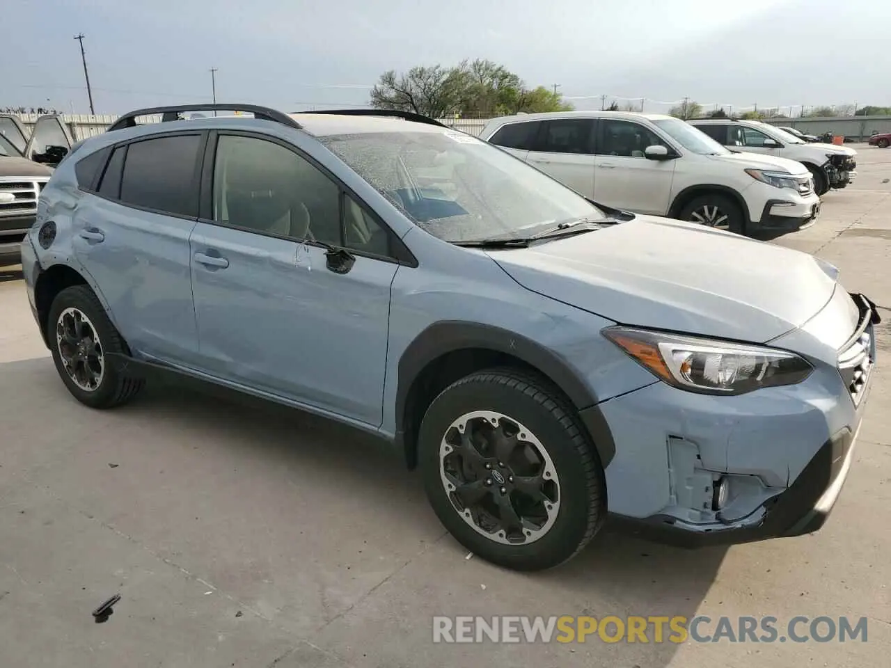 4 Photograph of a damaged car JF2GTAPC6NH219213 SUBARU CROSSTREK 2022