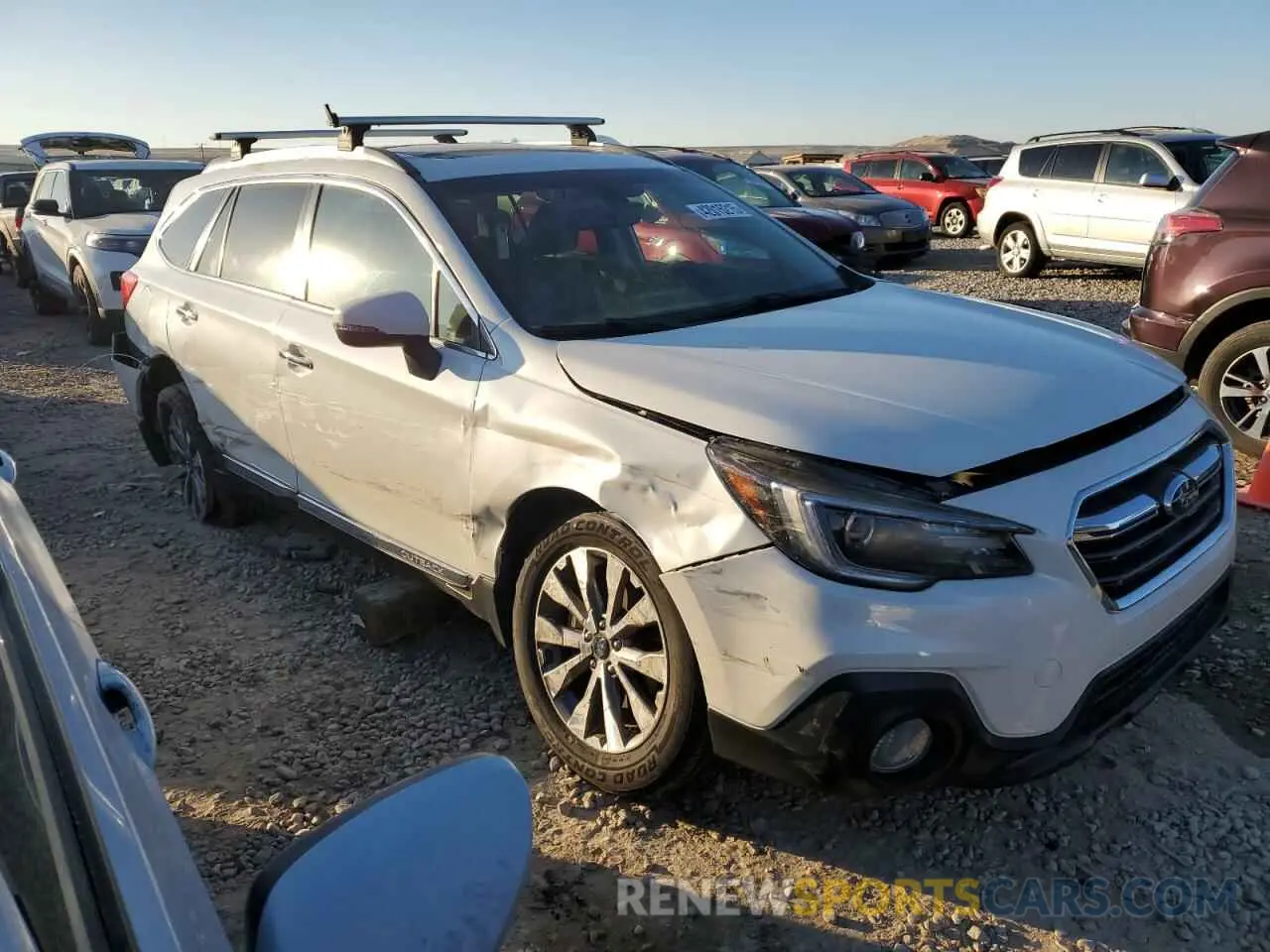 4 Photograph of a damaged car 4S4BSETC6K3241242 SUBARU OUTBACK 2019