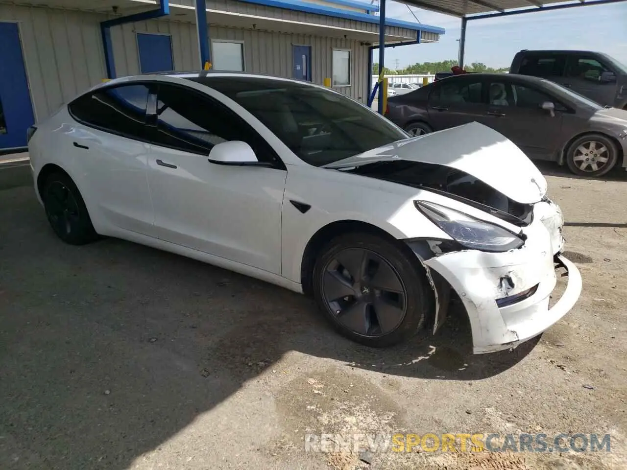 4 Photograph of a damaged car 5YJ3E1EA2NF114192 TESLA ALL OTHER 2022