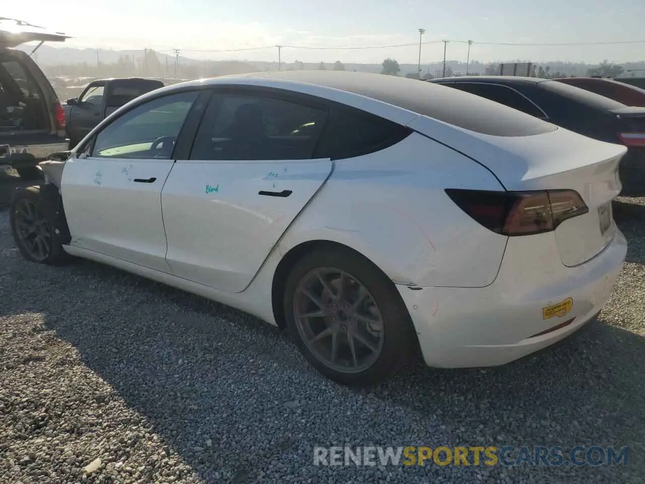 2 Photograph of a damaged car 5YJ3E1EBXNF200813 TESLA ALL OTHER 2022