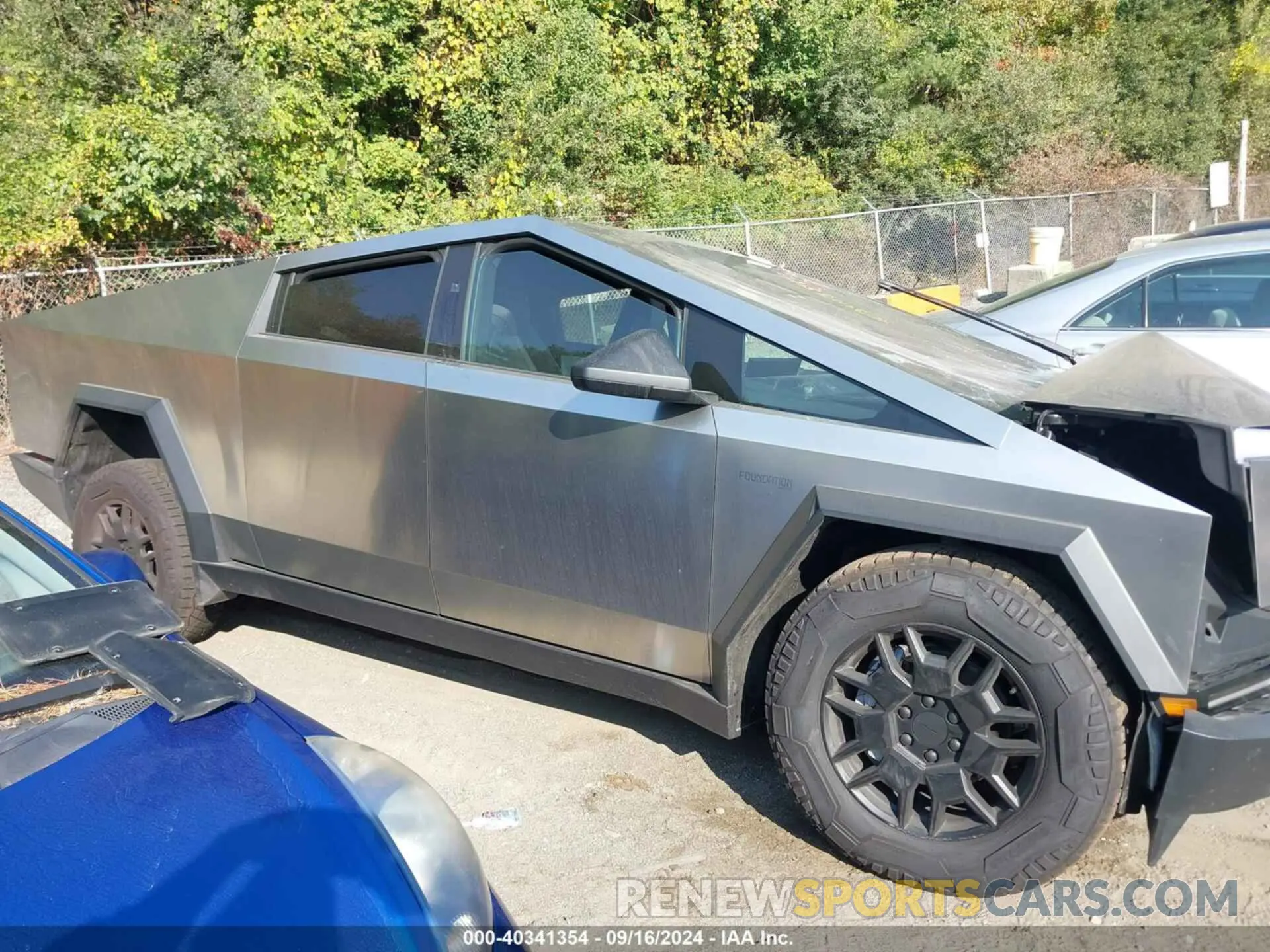 14 Photograph of a damaged car 7G2CEHED6RA005124 TESLA CYBERTRUCK 2024