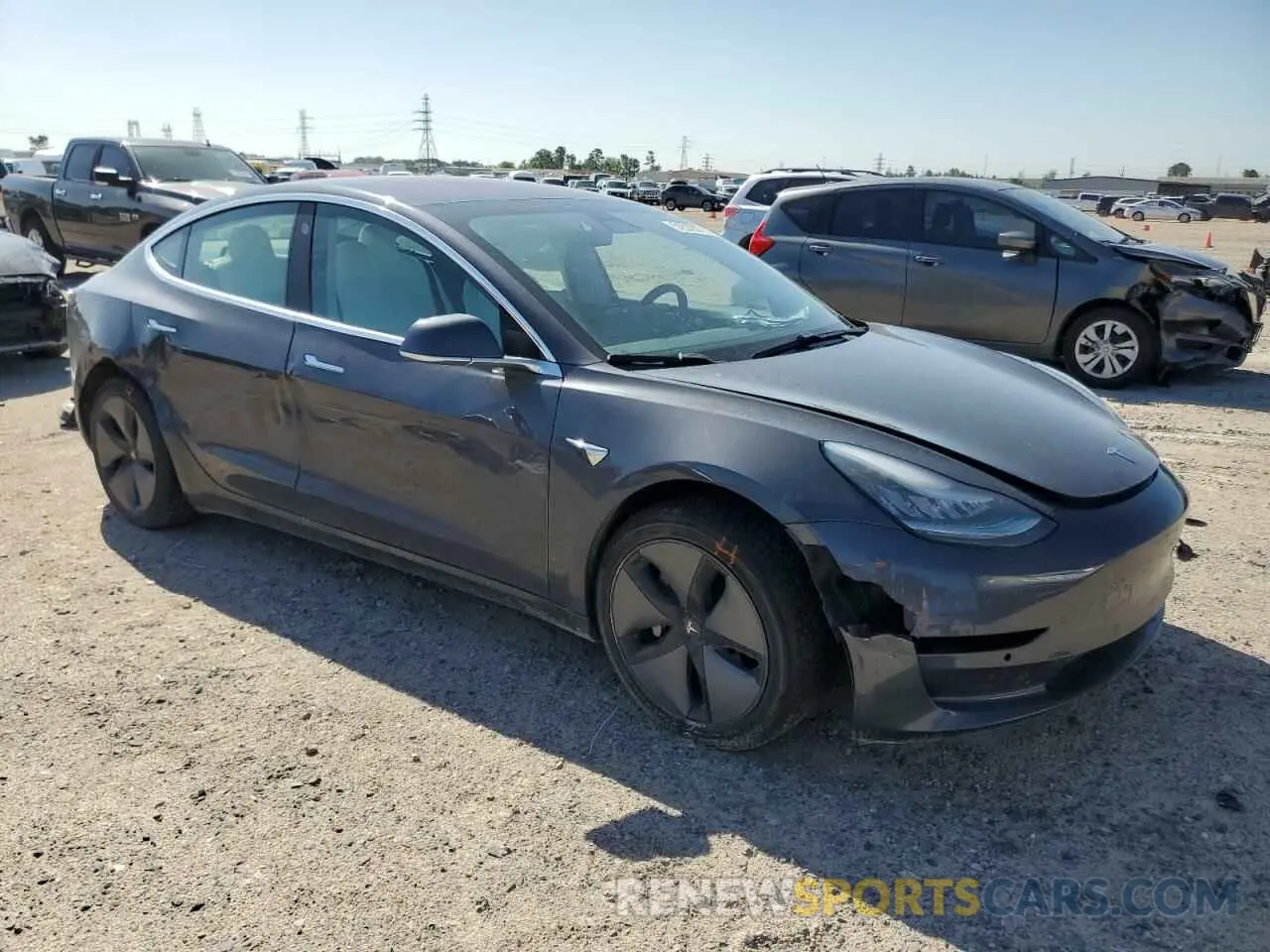 4 Photograph of a damaged car 5YJ3E1EA0KF312054 TESLA MODEL 3 2019