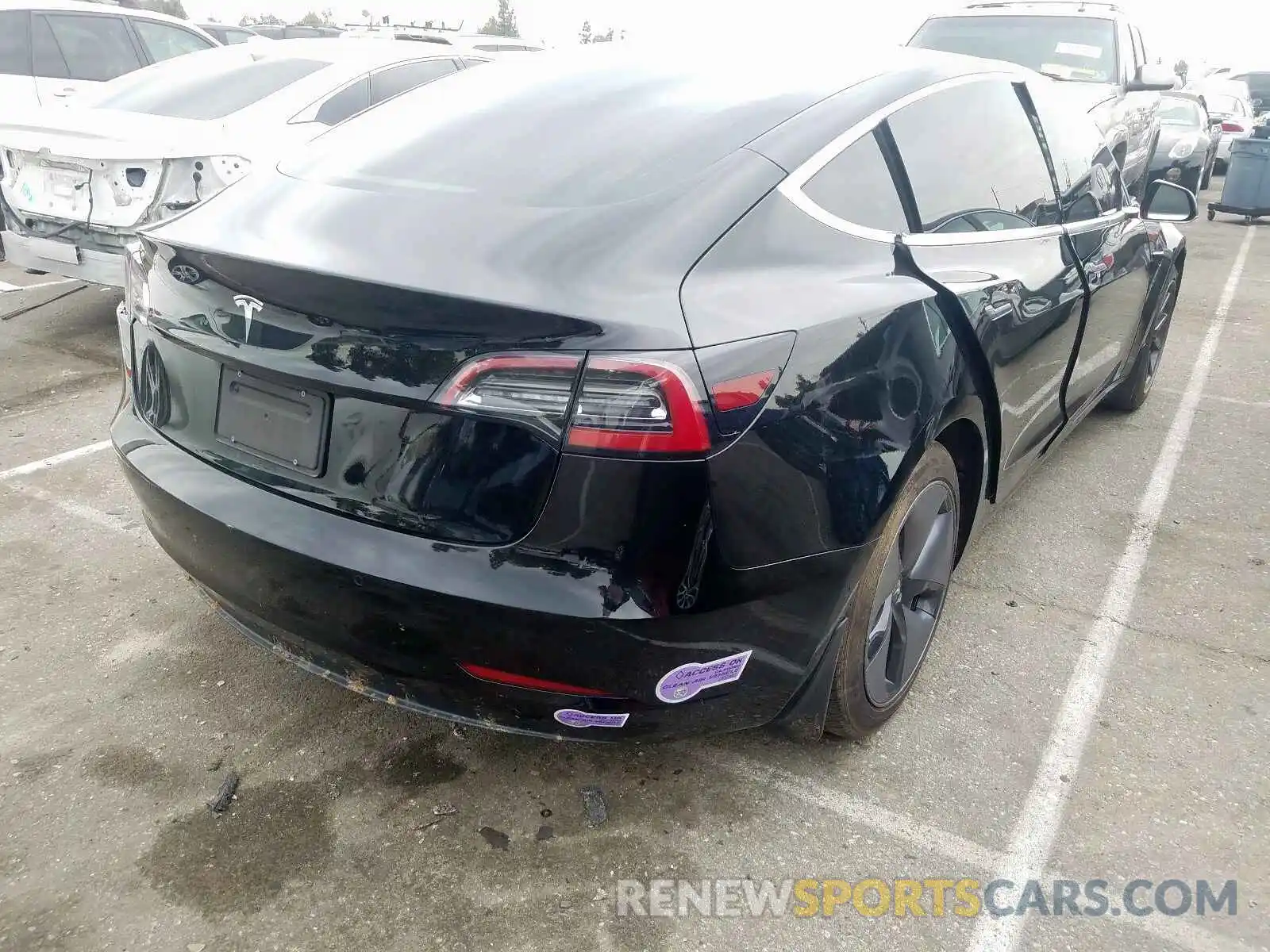 4 Photograph of a damaged car 5YJ3E1EA0KF325595 TESLA MODEL 3 2019