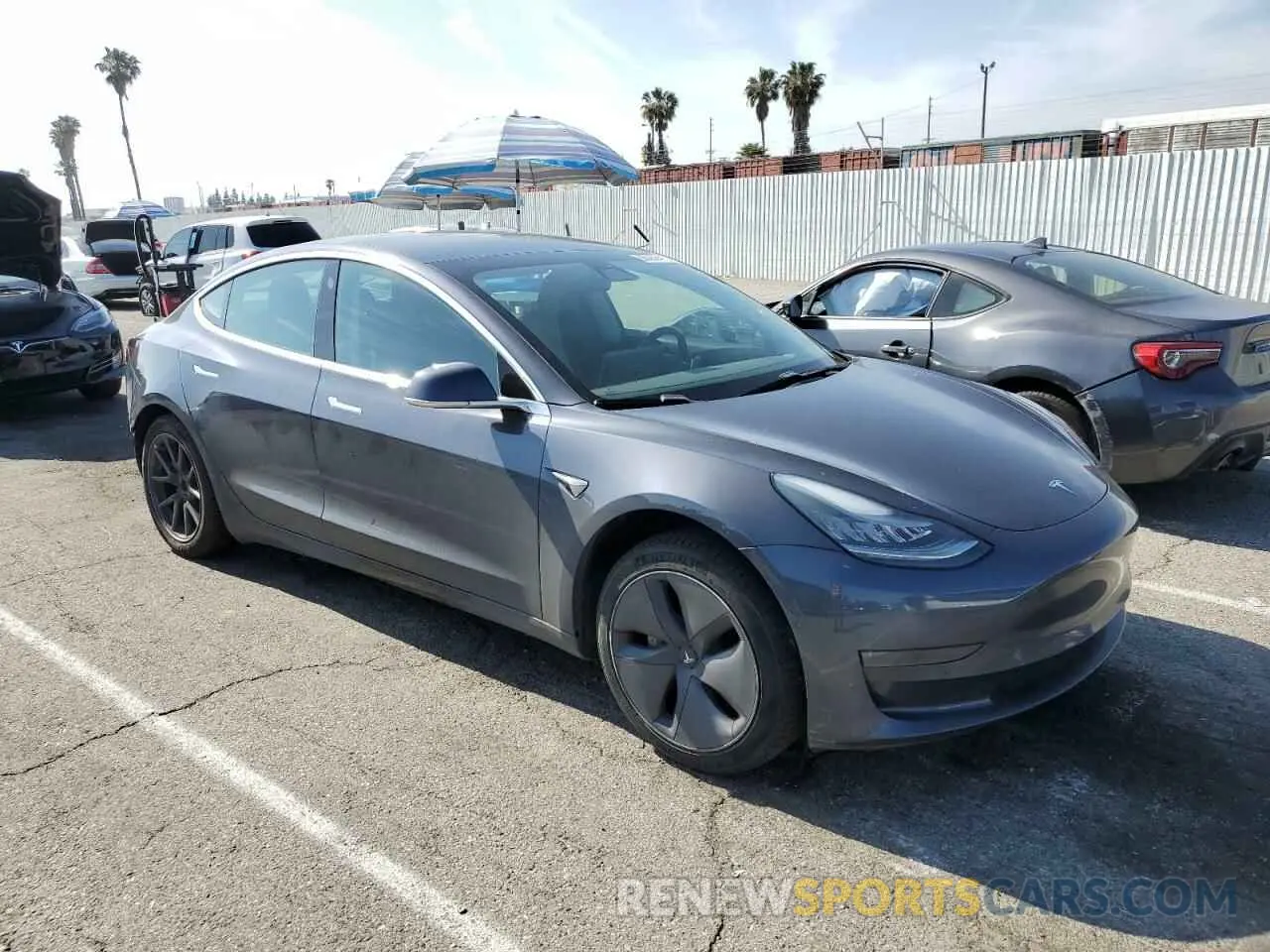 4 Photograph of a damaged car 5YJ3E1EA0KF411182 TESLA MODEL 3 2019