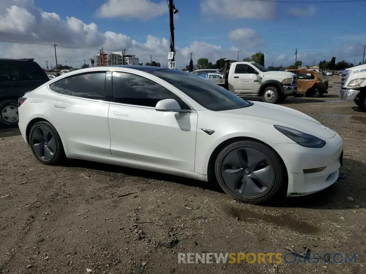 4 Photograph of a damaged car 5YJ3E1EA0KF464612 TESLA MODEL 3 2019