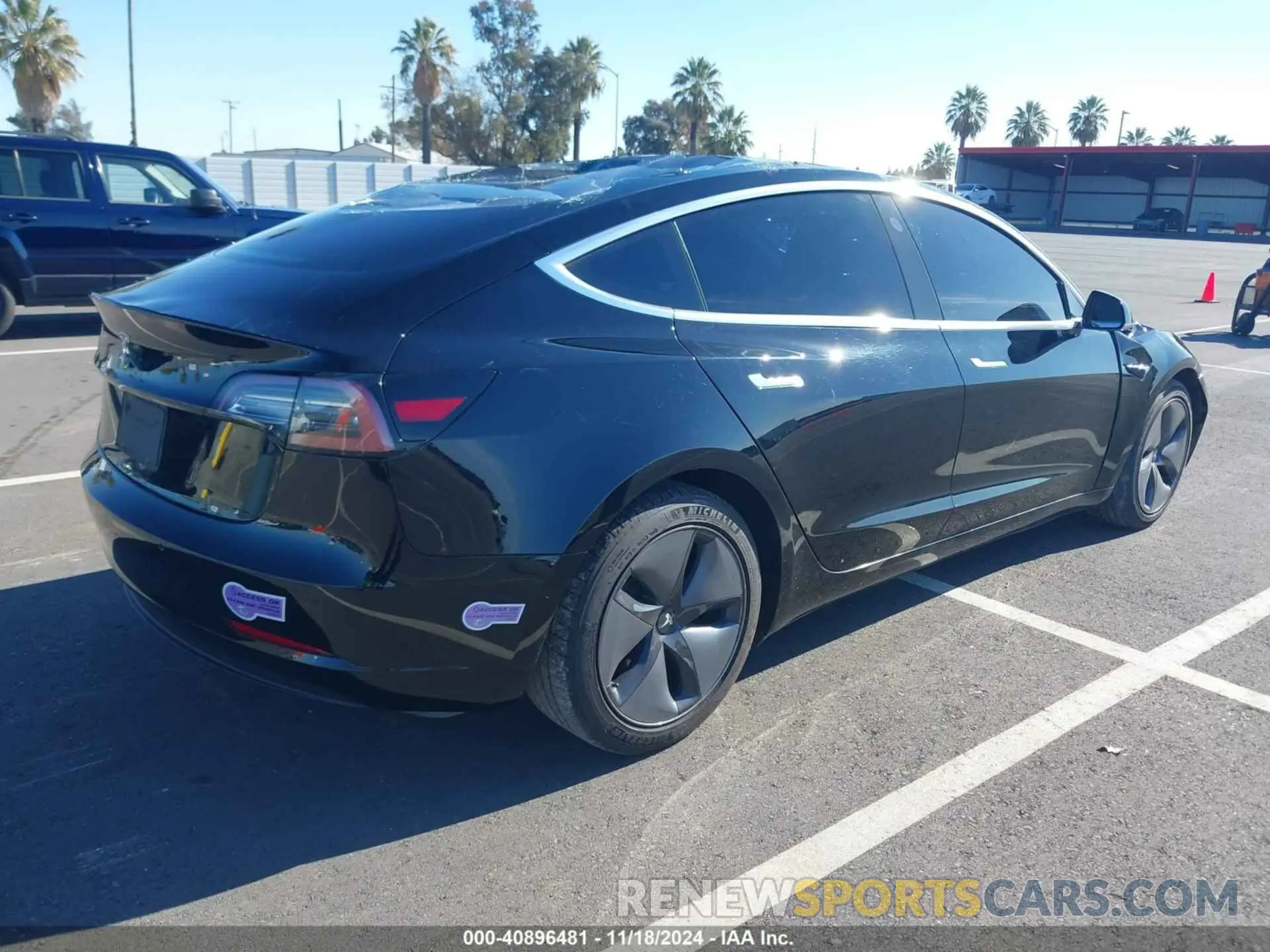 4 Photograph of a damaged car 5YJ3E1EA2KF189986 TESLA MODEL 3 2019