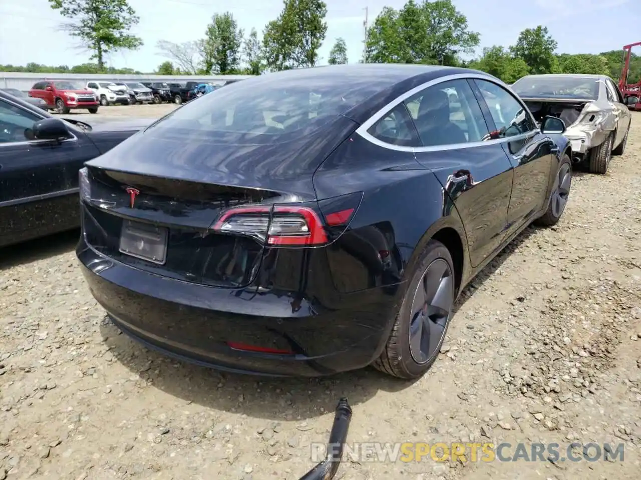 4 Photograph of a damaged car 5YJ3E1EA2KF313464 TESLA MODEL 3 2019