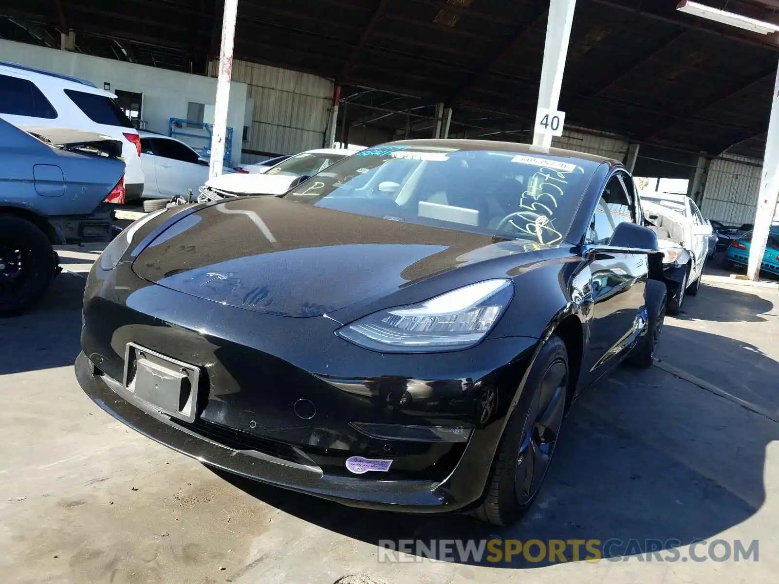 2 Photograph of a damaged car 5YJ3E1EA2KF325341 TESLA MODEL 3 2019