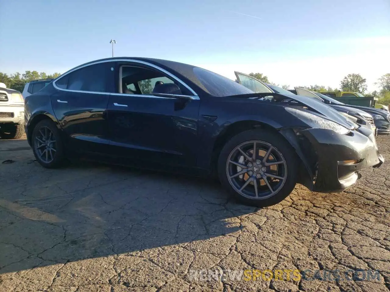 4 Photograph of a damaged car 5YJ3E1EA2KF399651 TESLA MODEL 3 2019