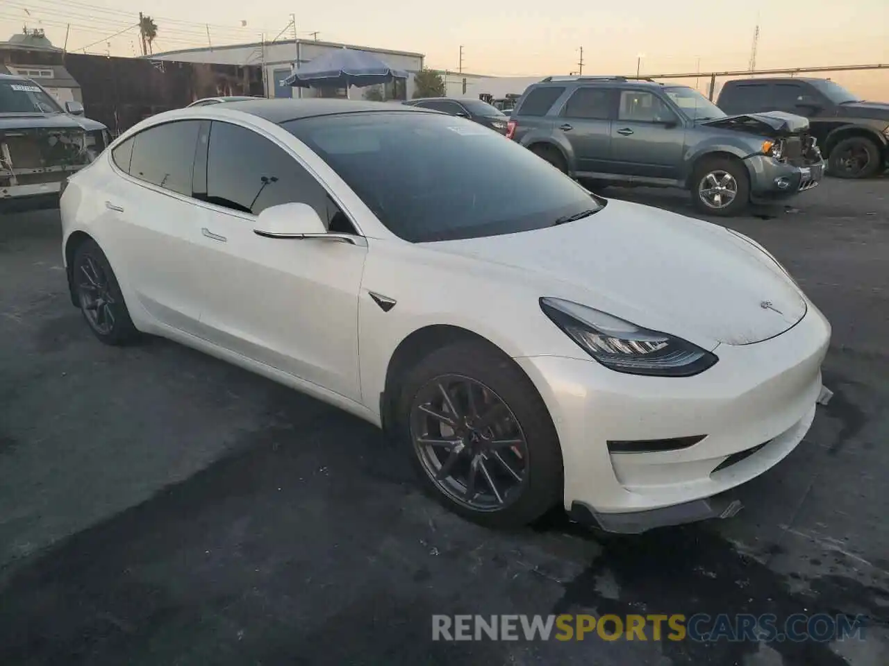 4 Photograph of a damaged car 5YJ3E1EA2KF425200 TESLA MODEL 3 2019