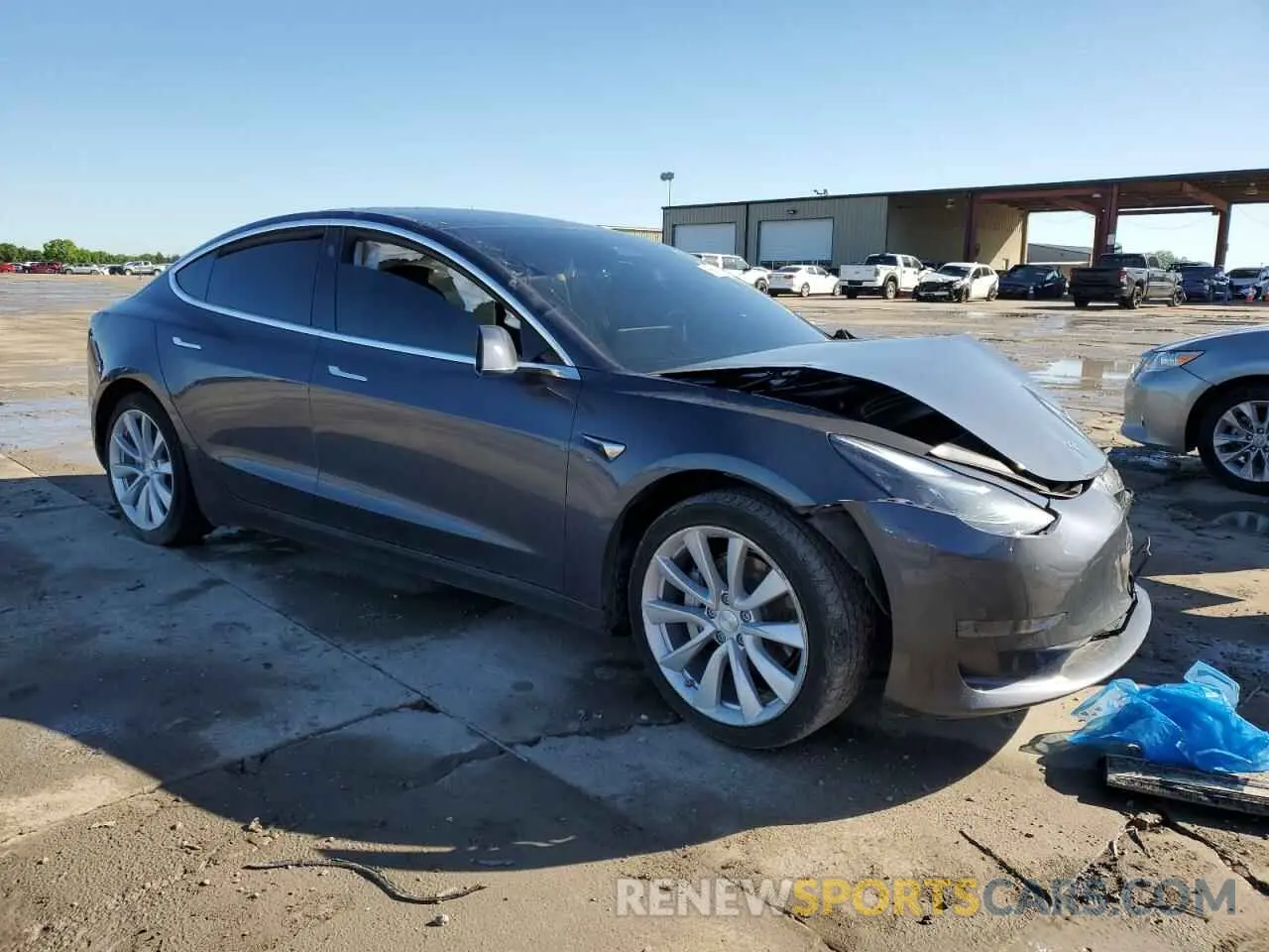 4 Photograph of a damaged car 5YJ3E1EA2KF474929 TESLA MODEL 3 2019