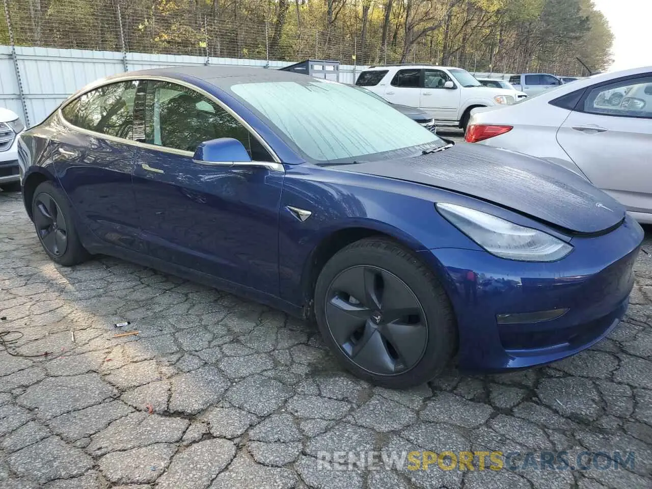 4 Photograph of a damaged car 5YJ3E1EA2KF476194 TESLA MODEL 3 2019