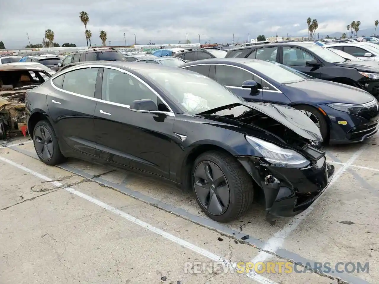 4 Photograph of a damaged car 5YJ3E1EA3KF189978 TESLA MODEL 3 2019