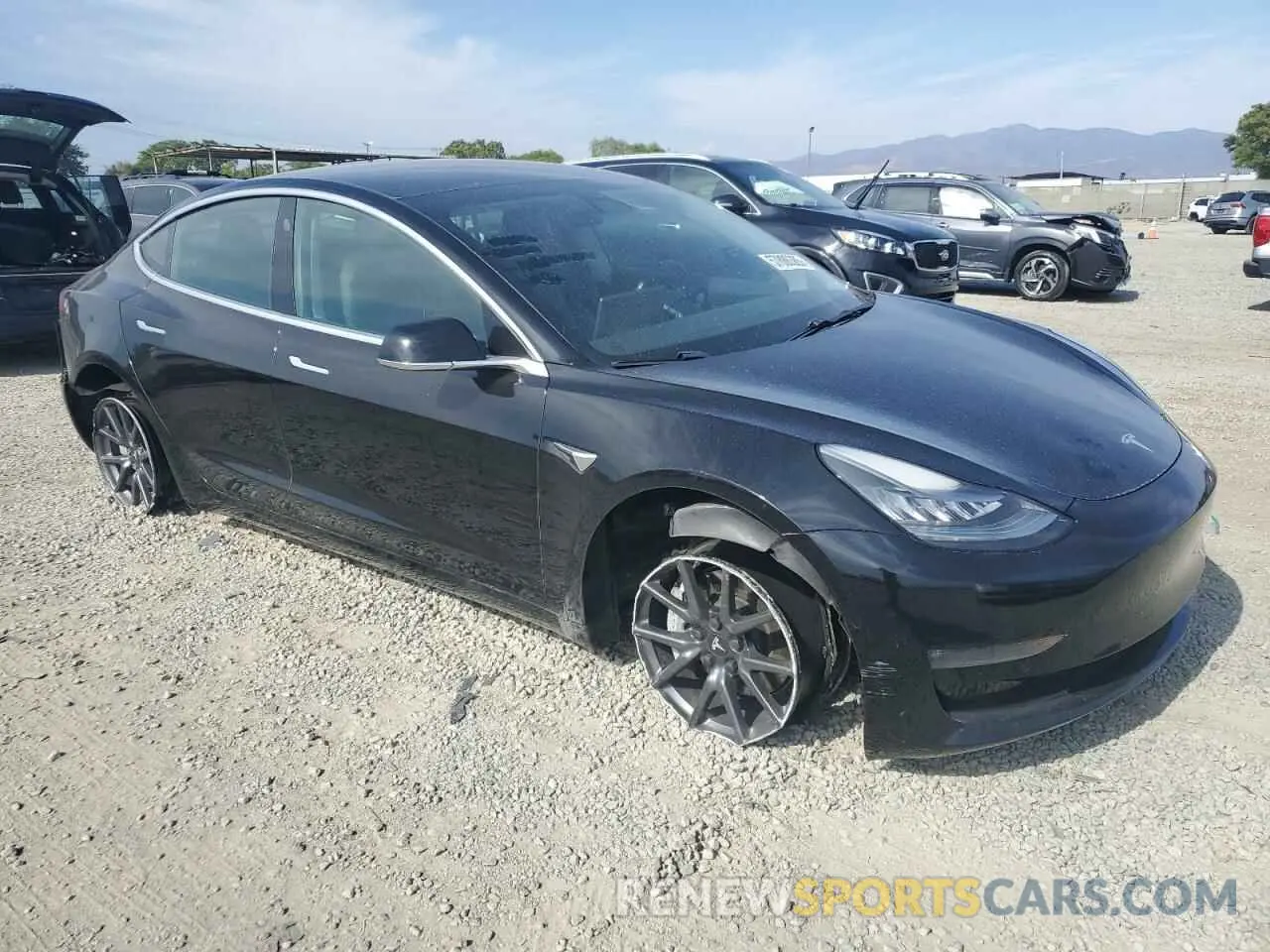 4 Photograph of a damaged car 5YJ3E1EA3KF395219 TESLA MODEL 3 2019