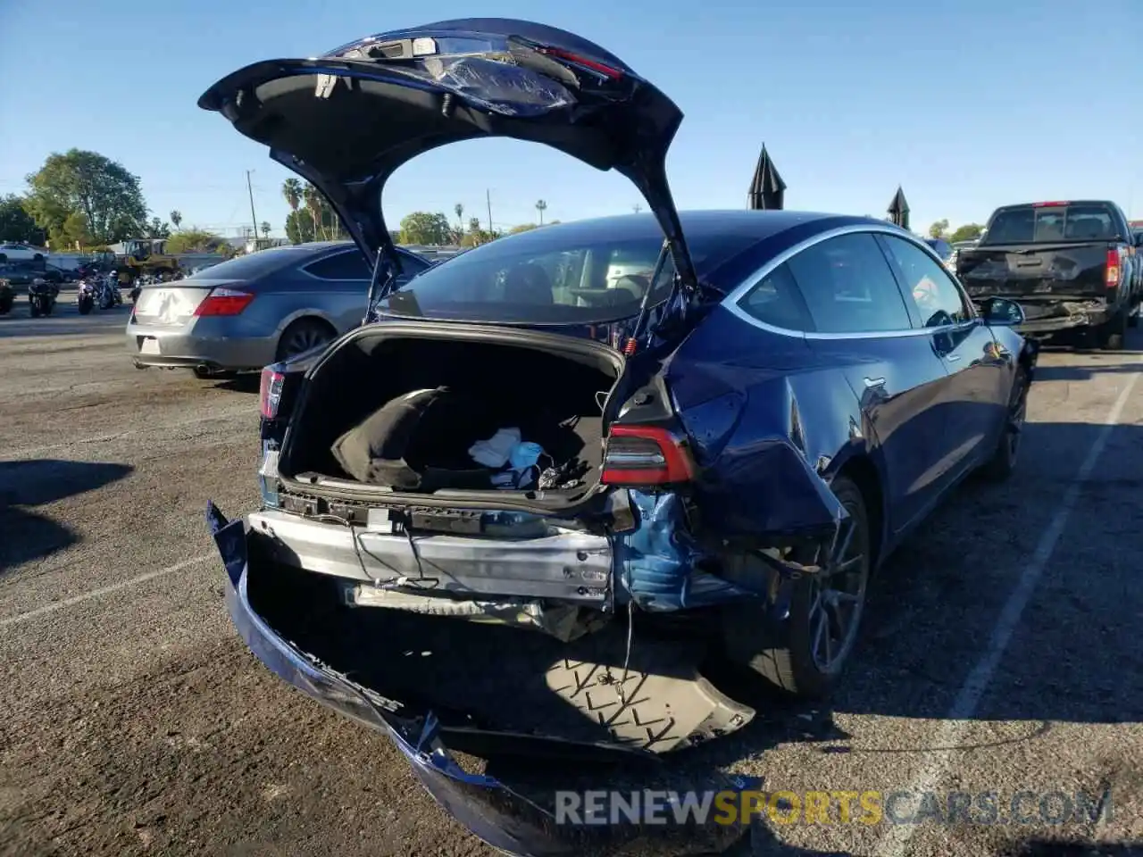 4 Photograph of a damaged car 5YJ3E1EA3KF400970 TESLA MODEL 3 2019