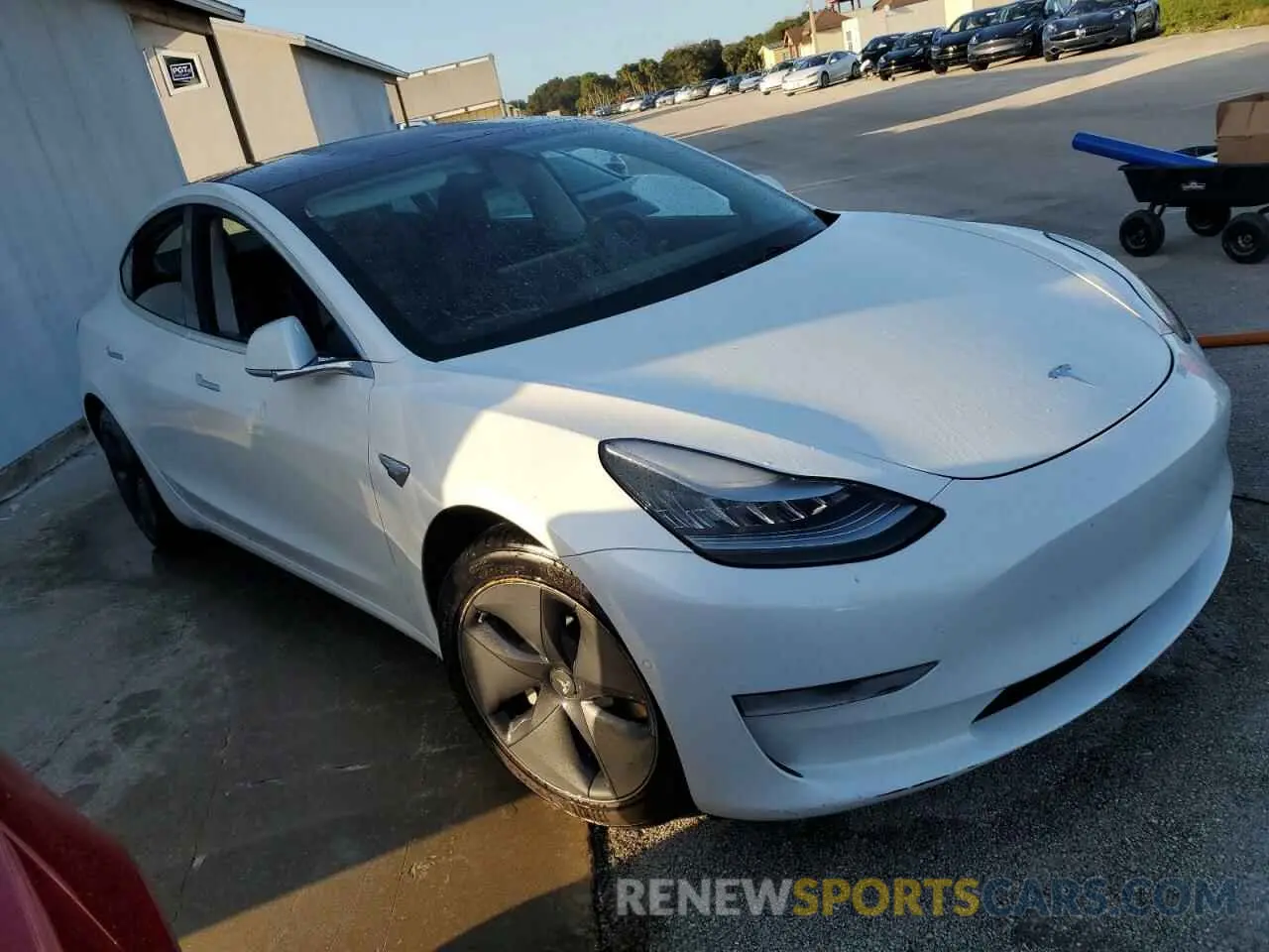 4 Photograph of a damaged car 5YJ3E1EA3KF411998 TESLA MODEL 3 2019