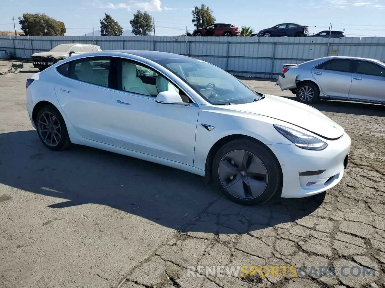4 Photograph of a damaged car 5YJ3E1EA4KF302160 TESLA MODEL 3 2019