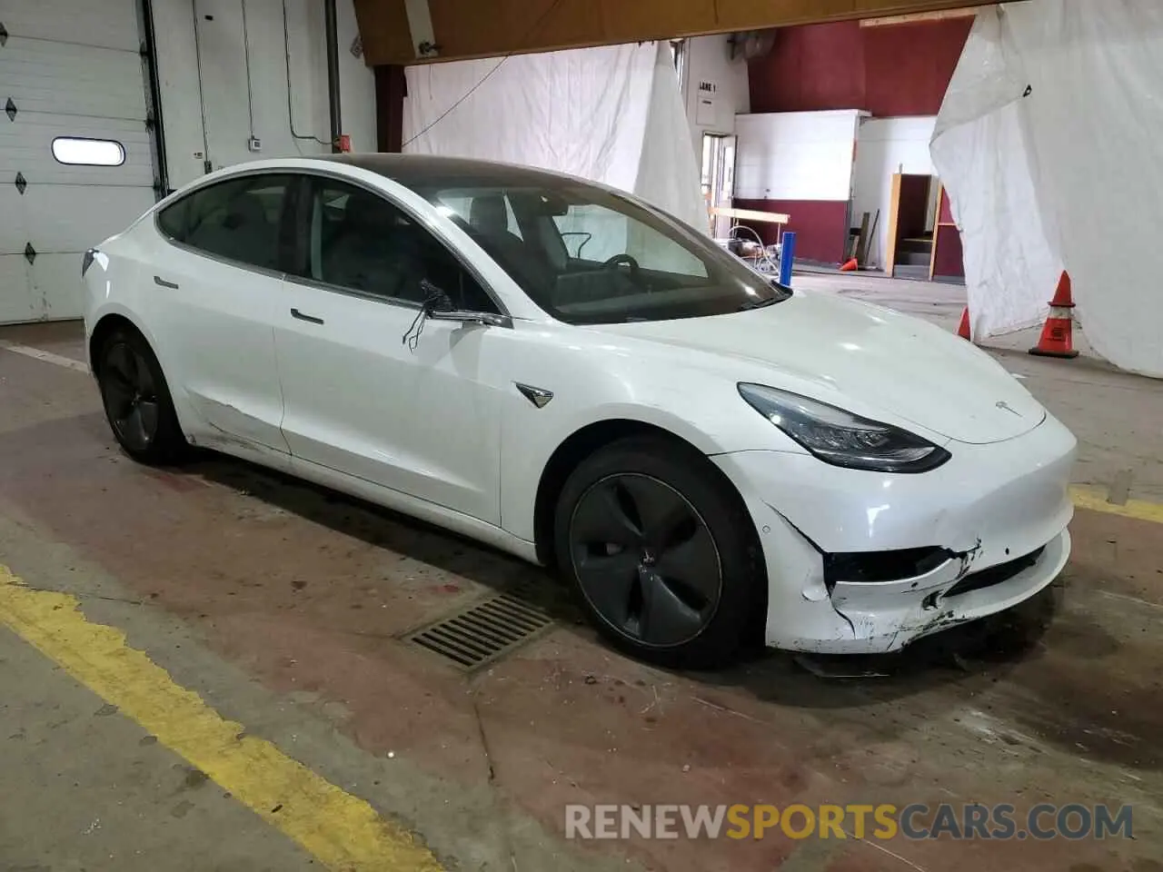 4 Photograph of a damaged car 5YJ3E1EA4KF309822 TESLA MODEL 3 2019