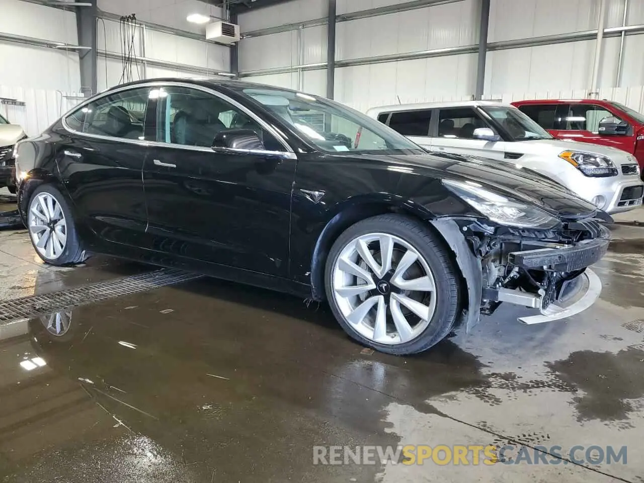 4 Photograph of a damaged car 5YJ3E1EA4KF310792 TESLA MODEL 3 2019