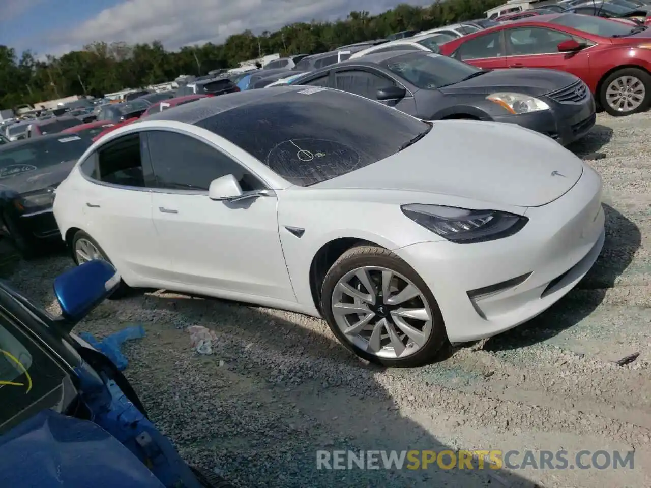 4 Photograph of a damaged car 5YJ3E1EA4KF338415 TESLA MODEL 3 2019