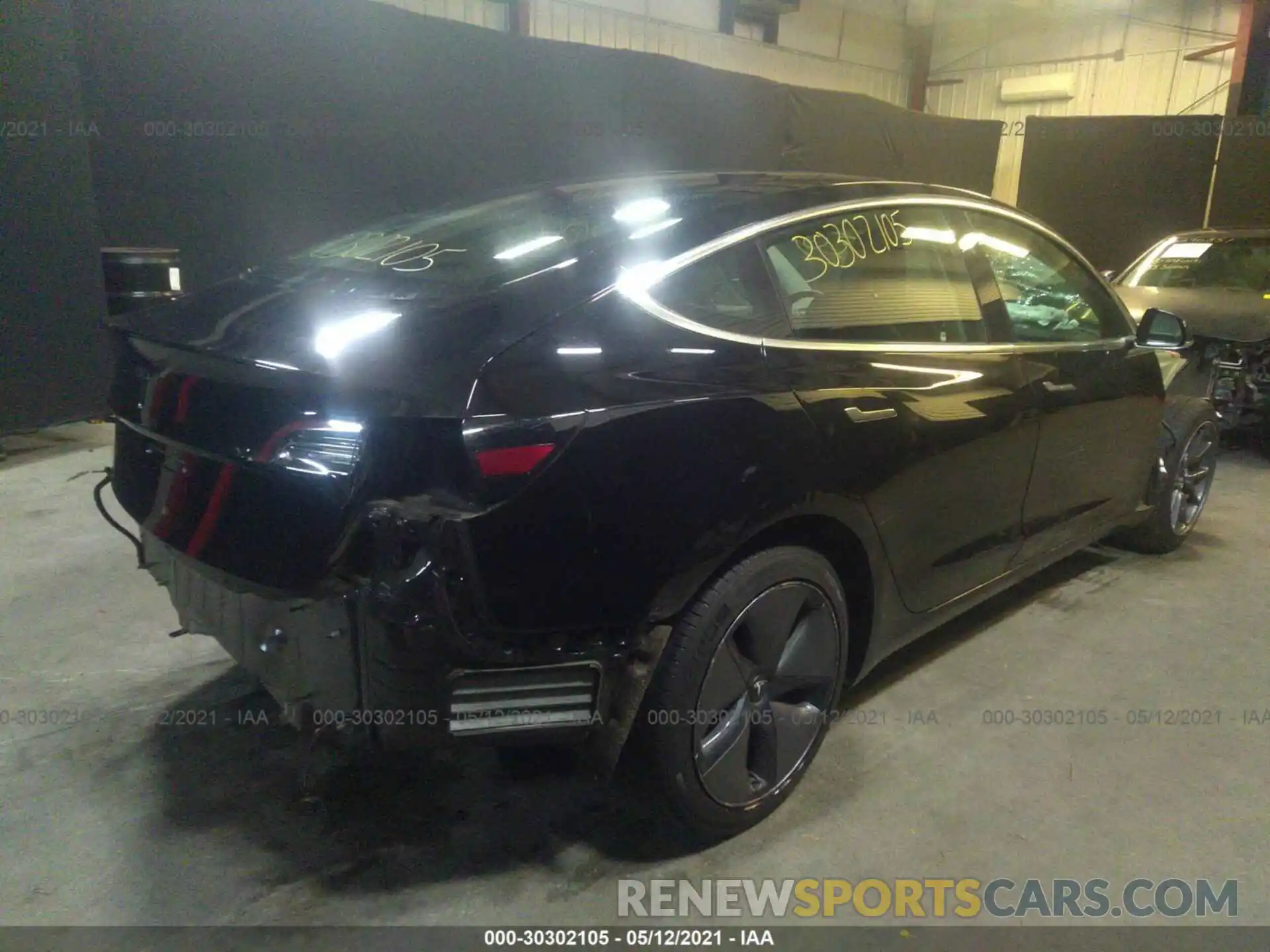 4 Photograph of a damaged car 5YJ3E1EA4KF395231 TESLA MODEL 3 2019