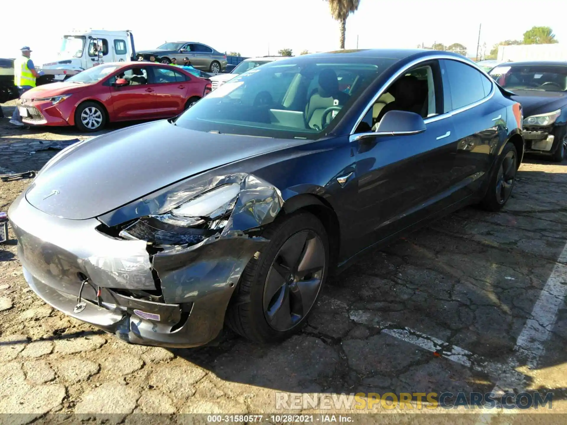 2 Photograph of a damaged car 5YJ3E1EA4KF411394 TESLA MODEL 3 2019