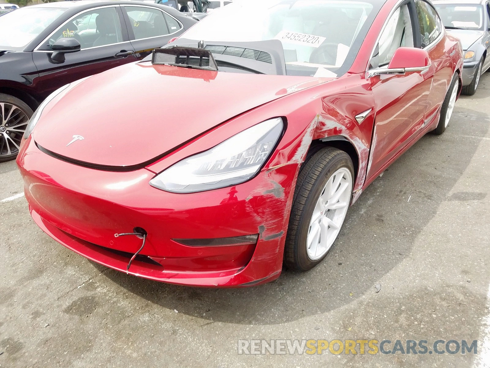 2 Photograph of a damaged car 5YJ3E1EA4KF413100 TESLA MODEL 3 2019