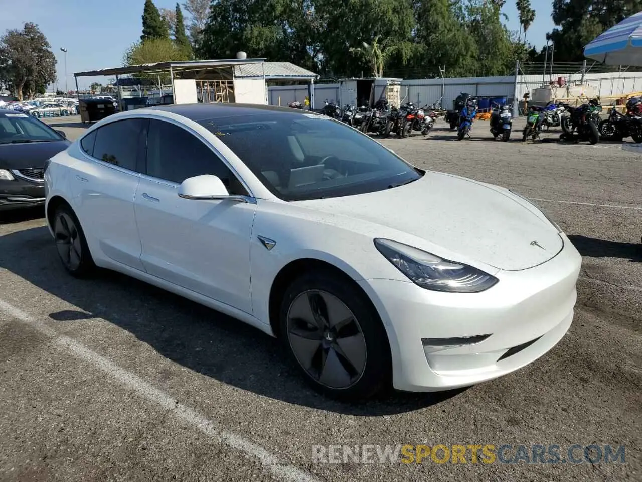 4 Photograph of a damaged car 5YJ3E1EA5KF299768 TESLA MODEL 3 2019