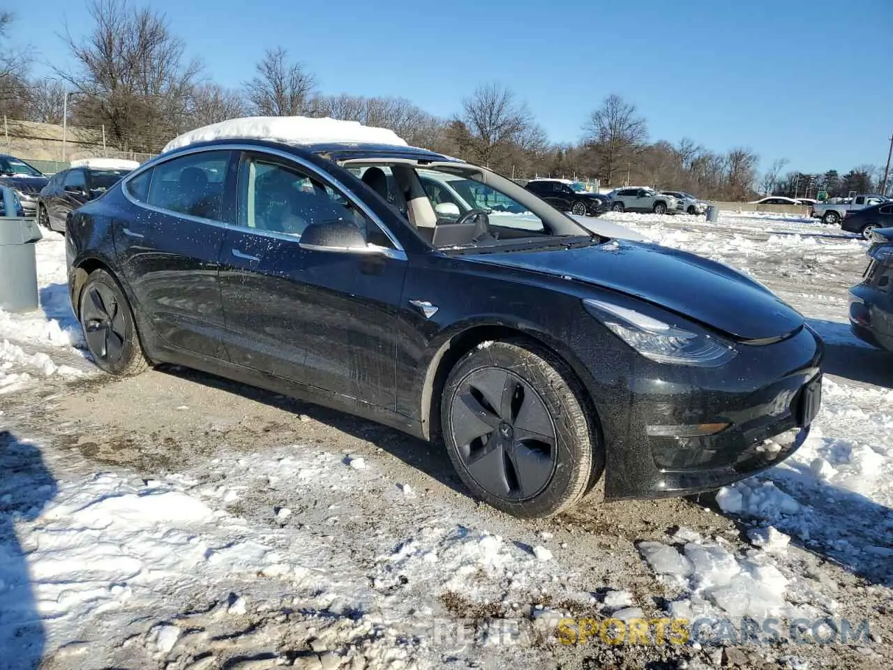 4 Photograph of a damaged car 5YJ3E1EA5KF306430 TESLA MODEL 3 2019