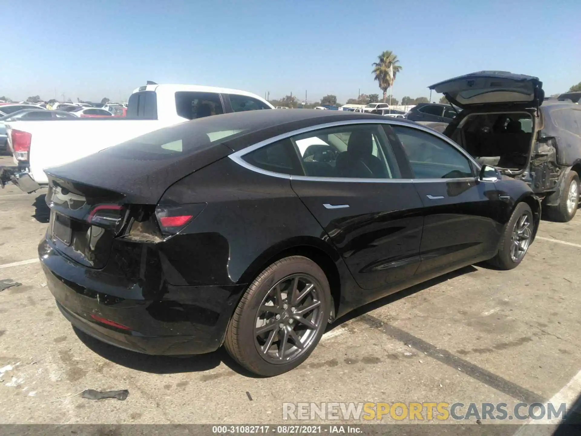 4 Photograph of a damaged car 5YJ3E1EA5KF323843 TESLA MODEL 3 2019