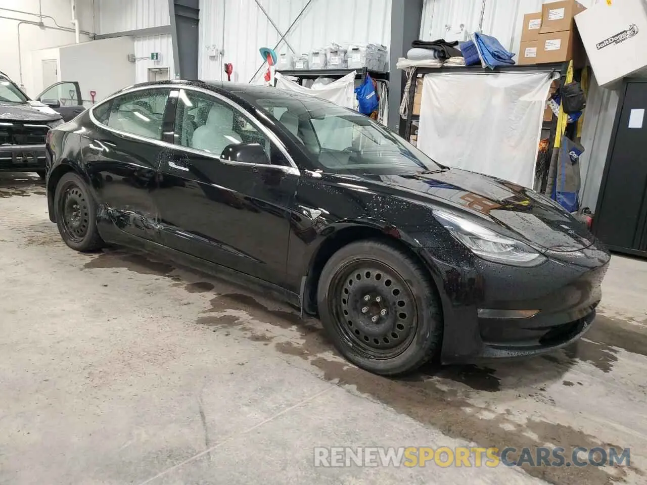 4 Photograph of a damaged car 5YJ3E1EA5KF407757 TESLA MODEL 3 2019