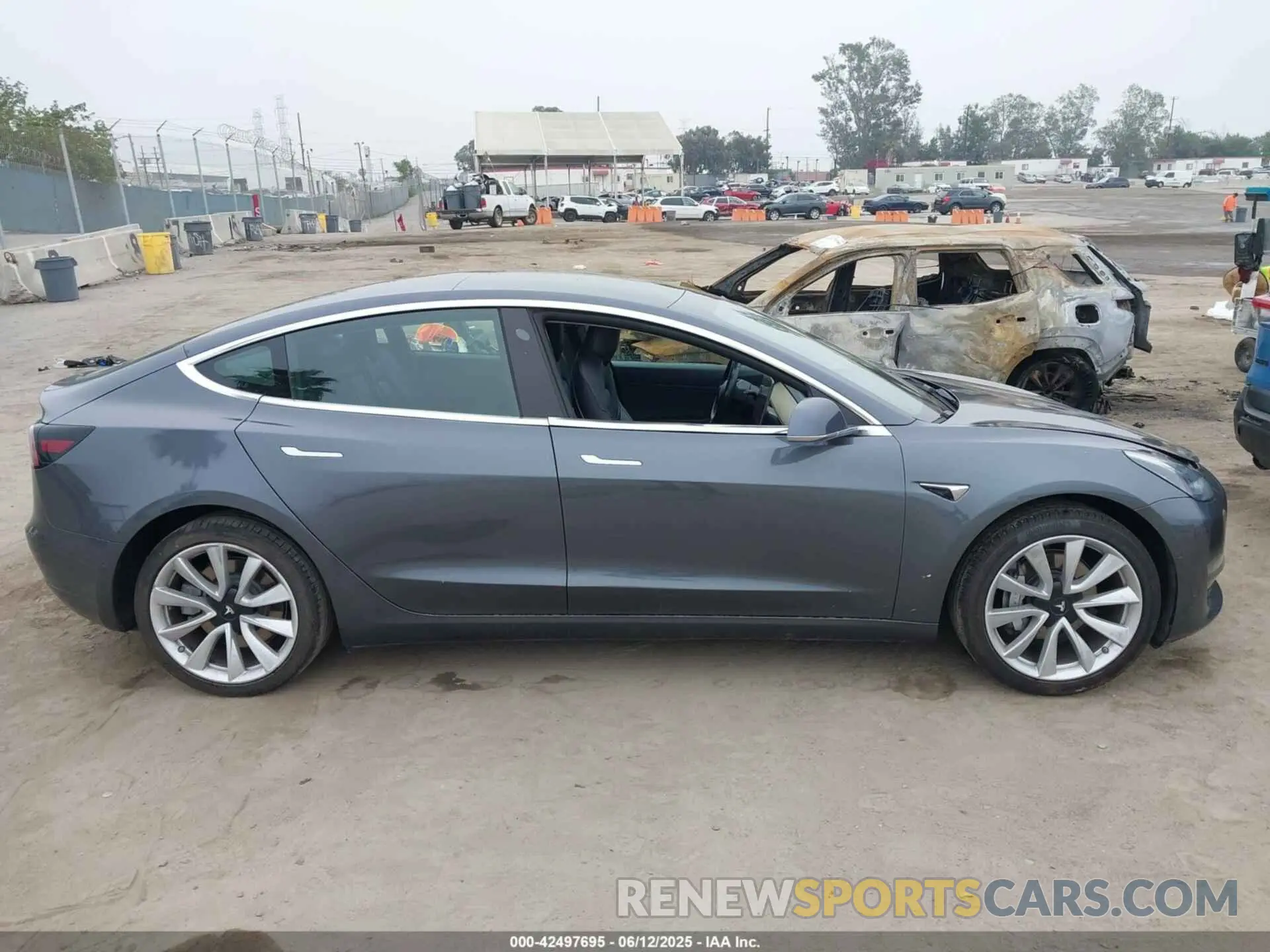 12 Photograph of a damaged car 5YJ3E1EA5KF412599 TESLA MODEL 3 2019