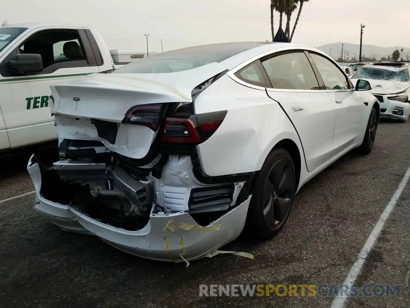 4 Photograph of a damaged car 5YJ3E1EA5KF431816 TESLA MODEL 3 2019