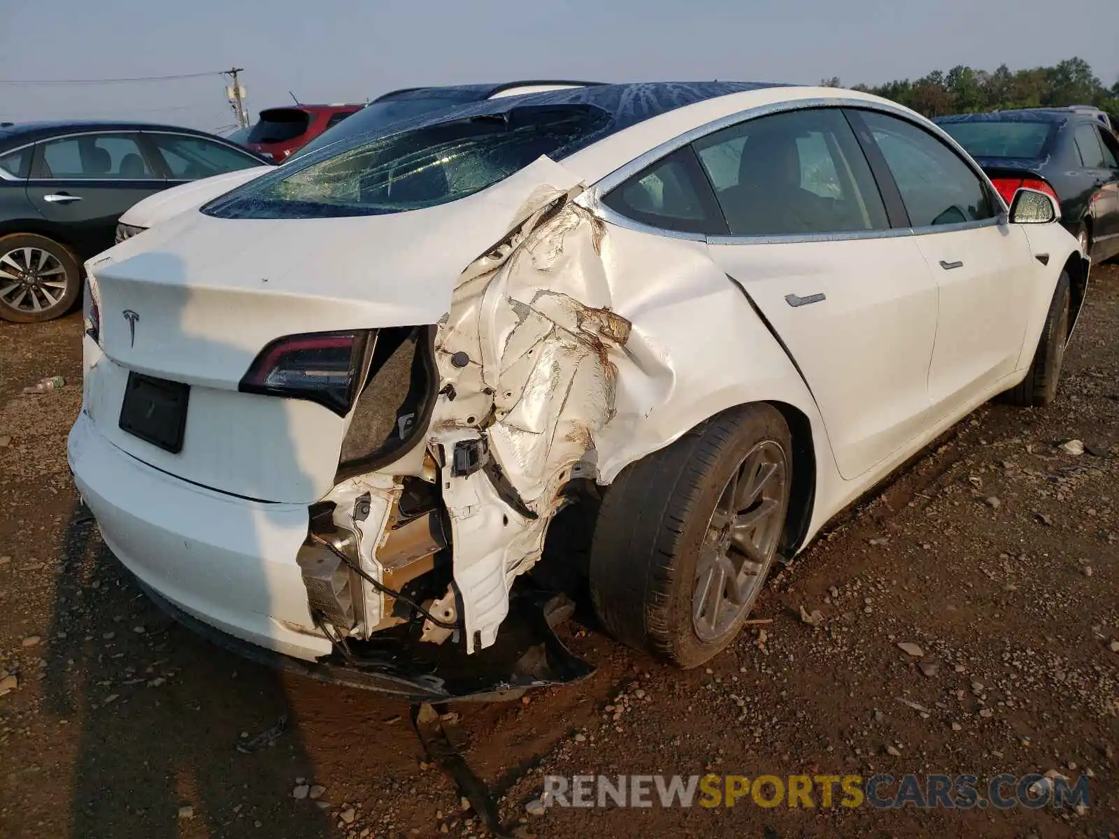 4 Photograph of a damaged car 5YJ3E1EA5KF483964 TESLA MODEL 3 2019